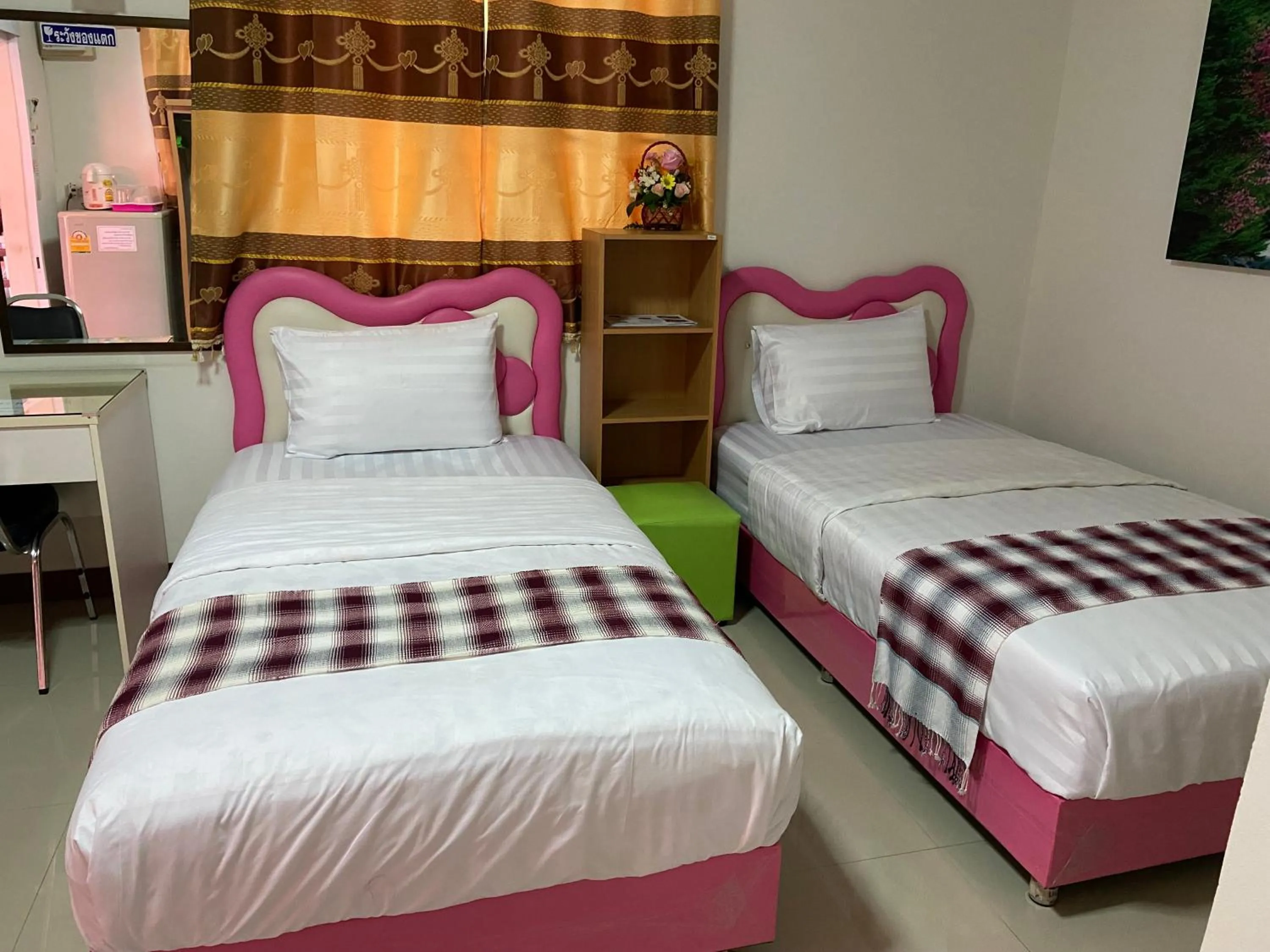 Bed in บุญจินดา รีสอร์ท