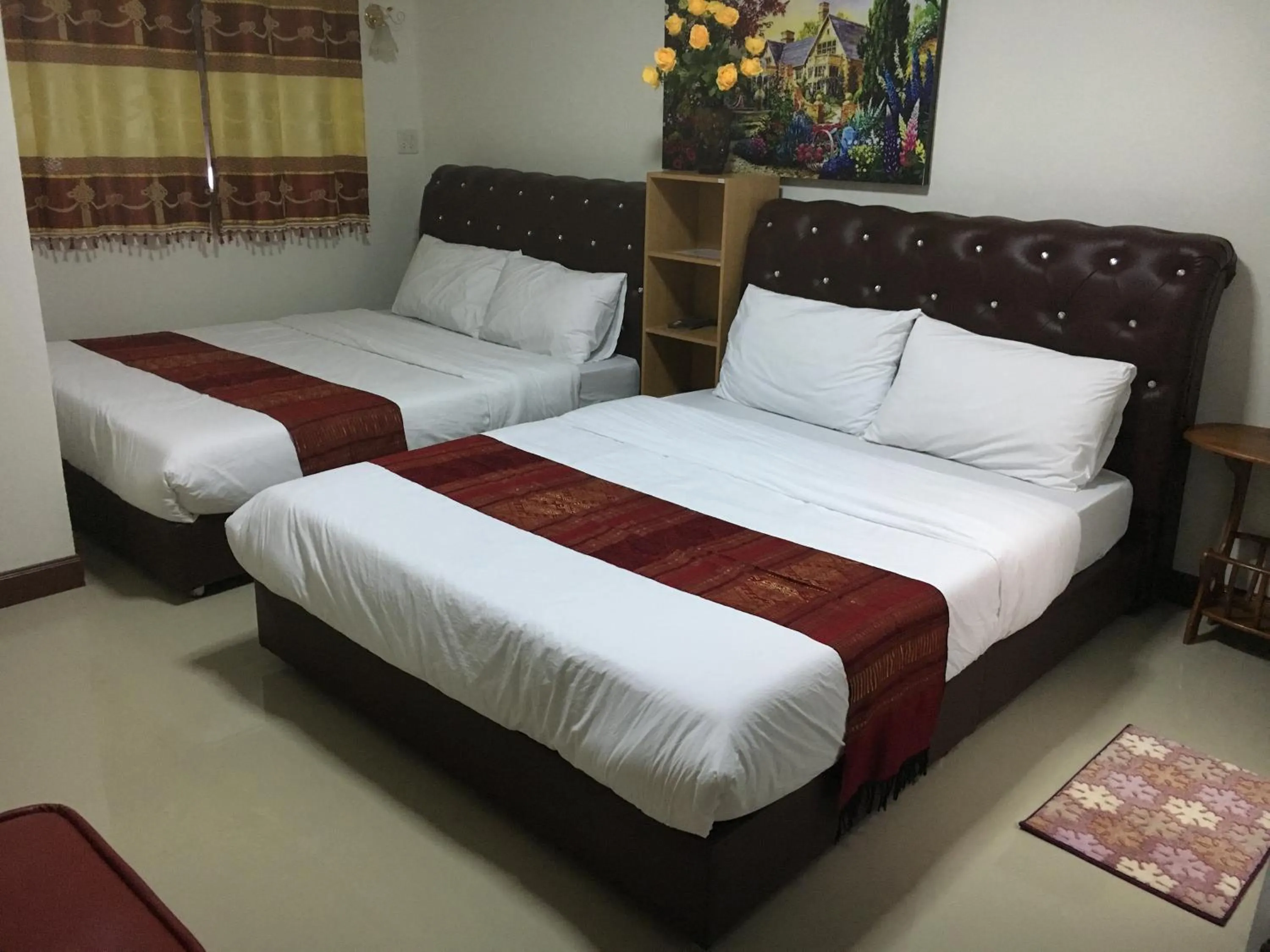 Photo of the whole room, Bed in บุญจินดา รีสอร์ท