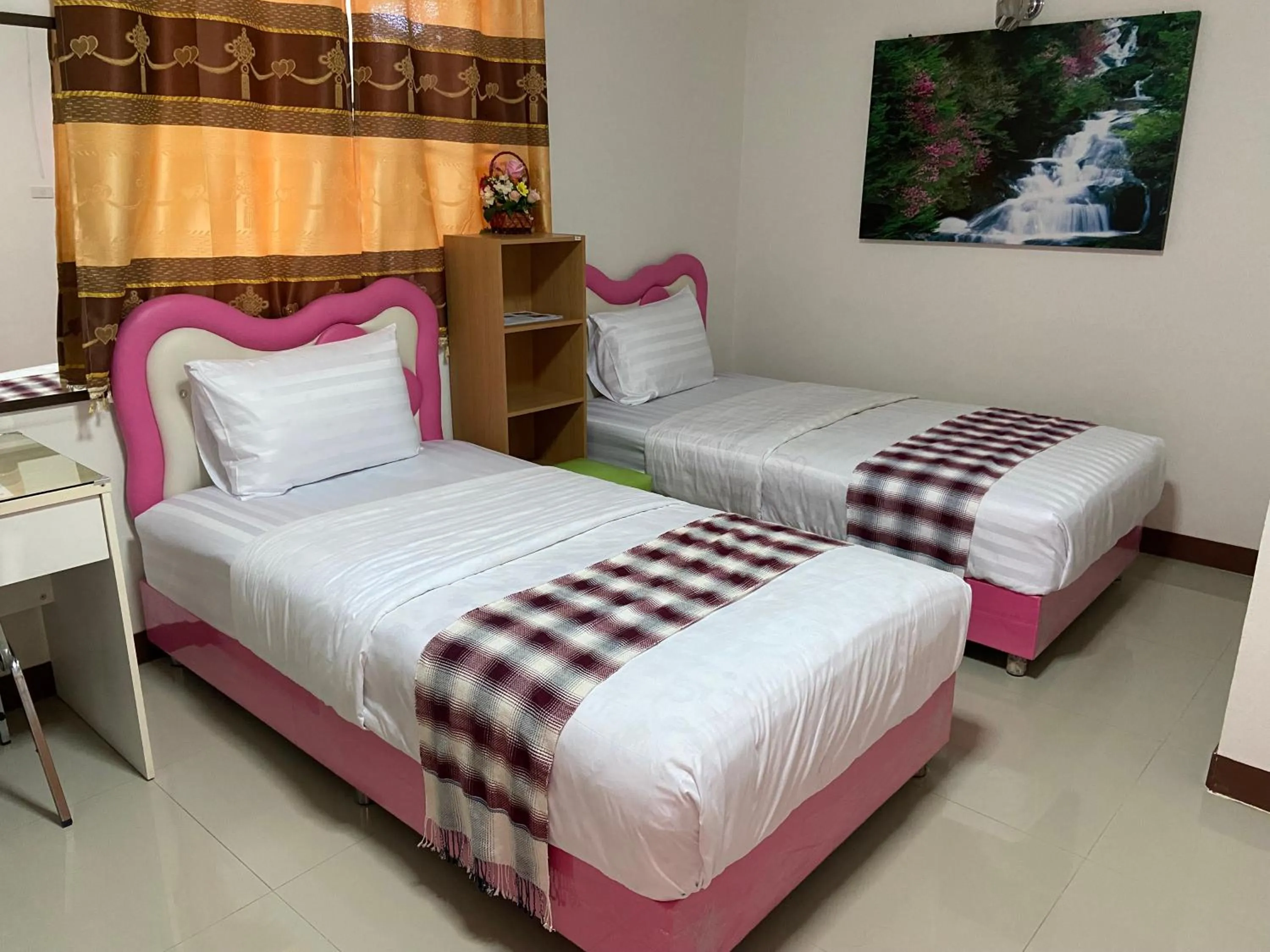Bed in บุญจินดา รีสอร์ท