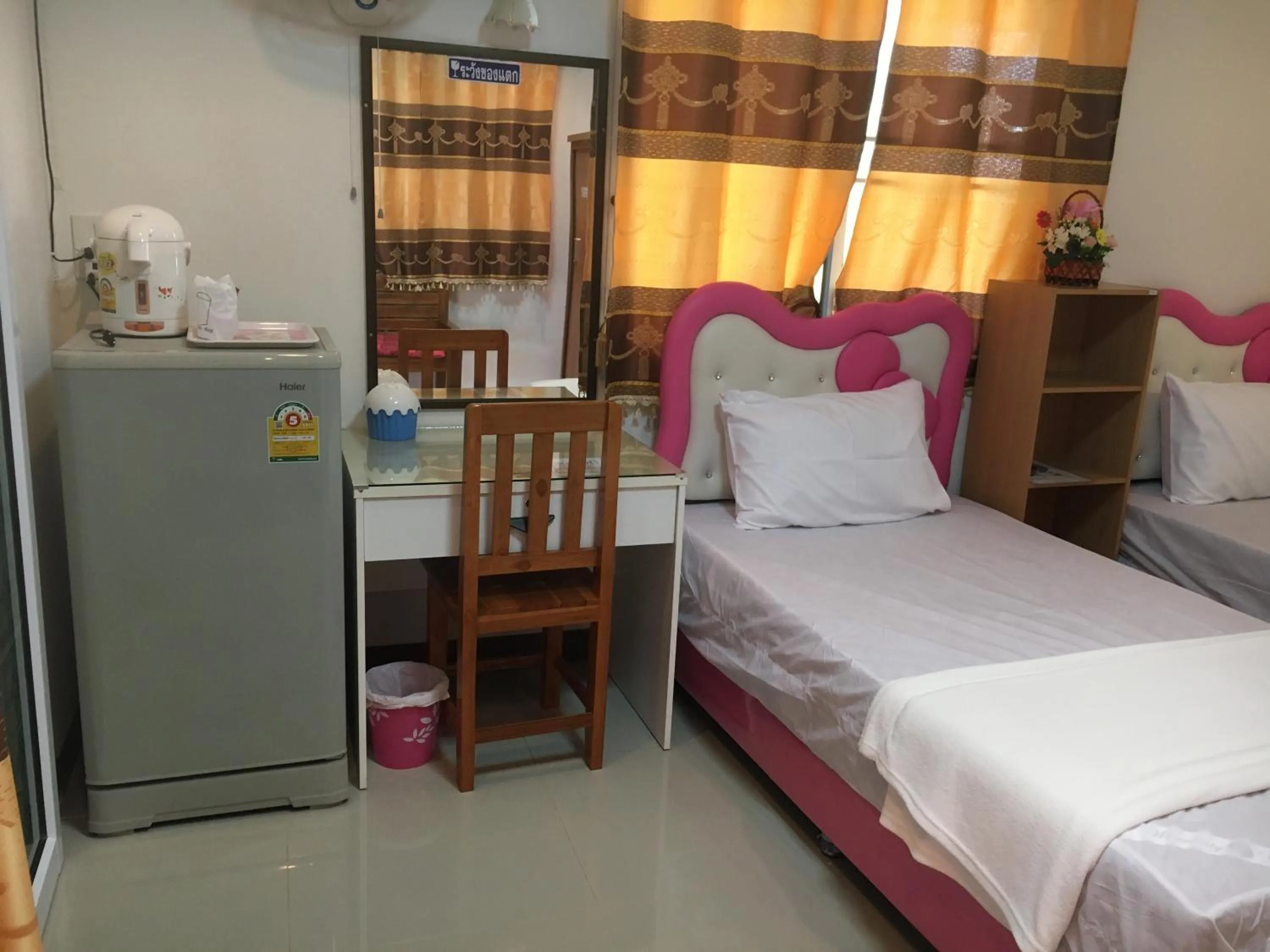 Bed in บุญจินดา รีสอร์ท