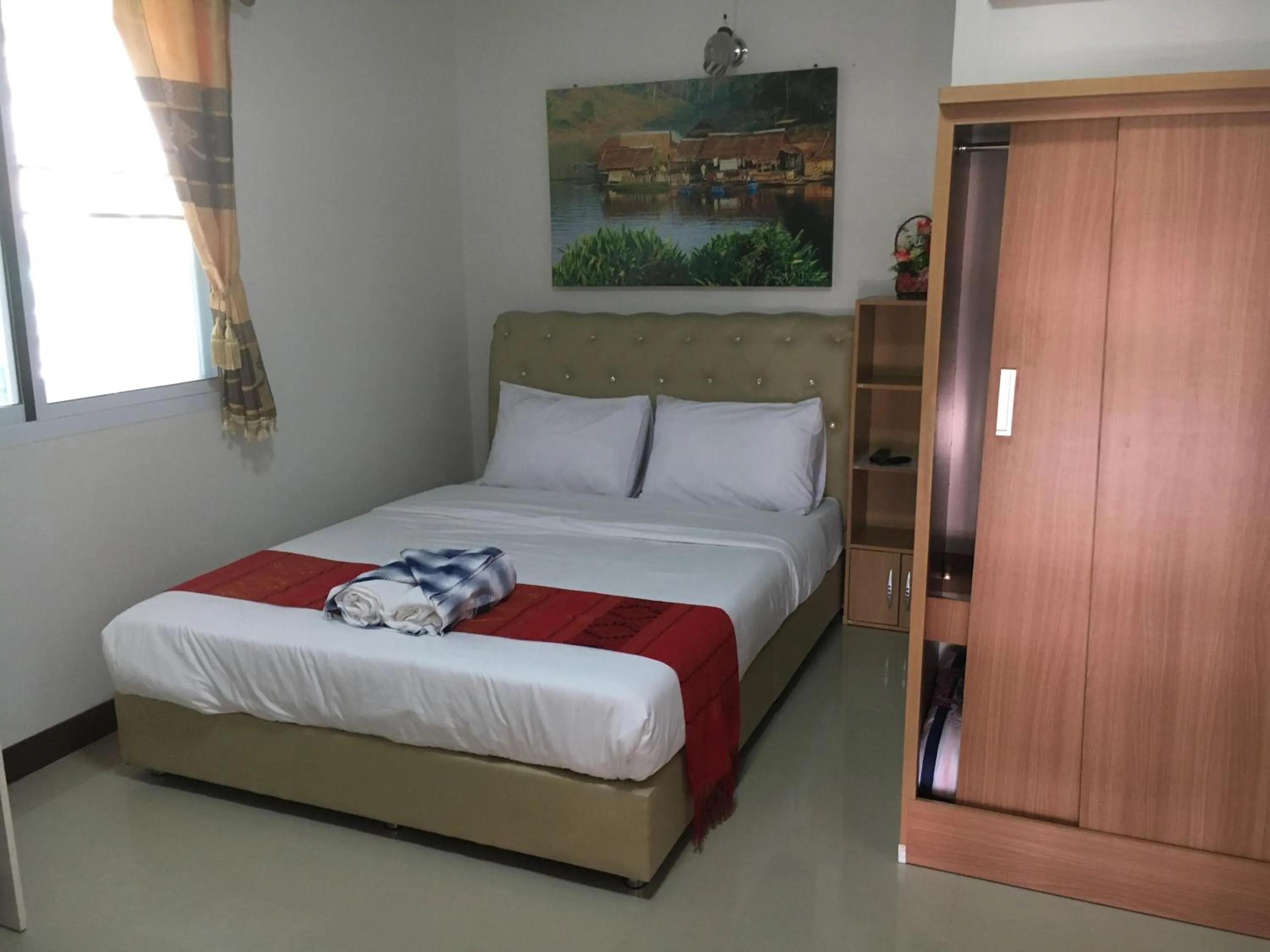 Bed in บุญจินดา รีสอร์ท