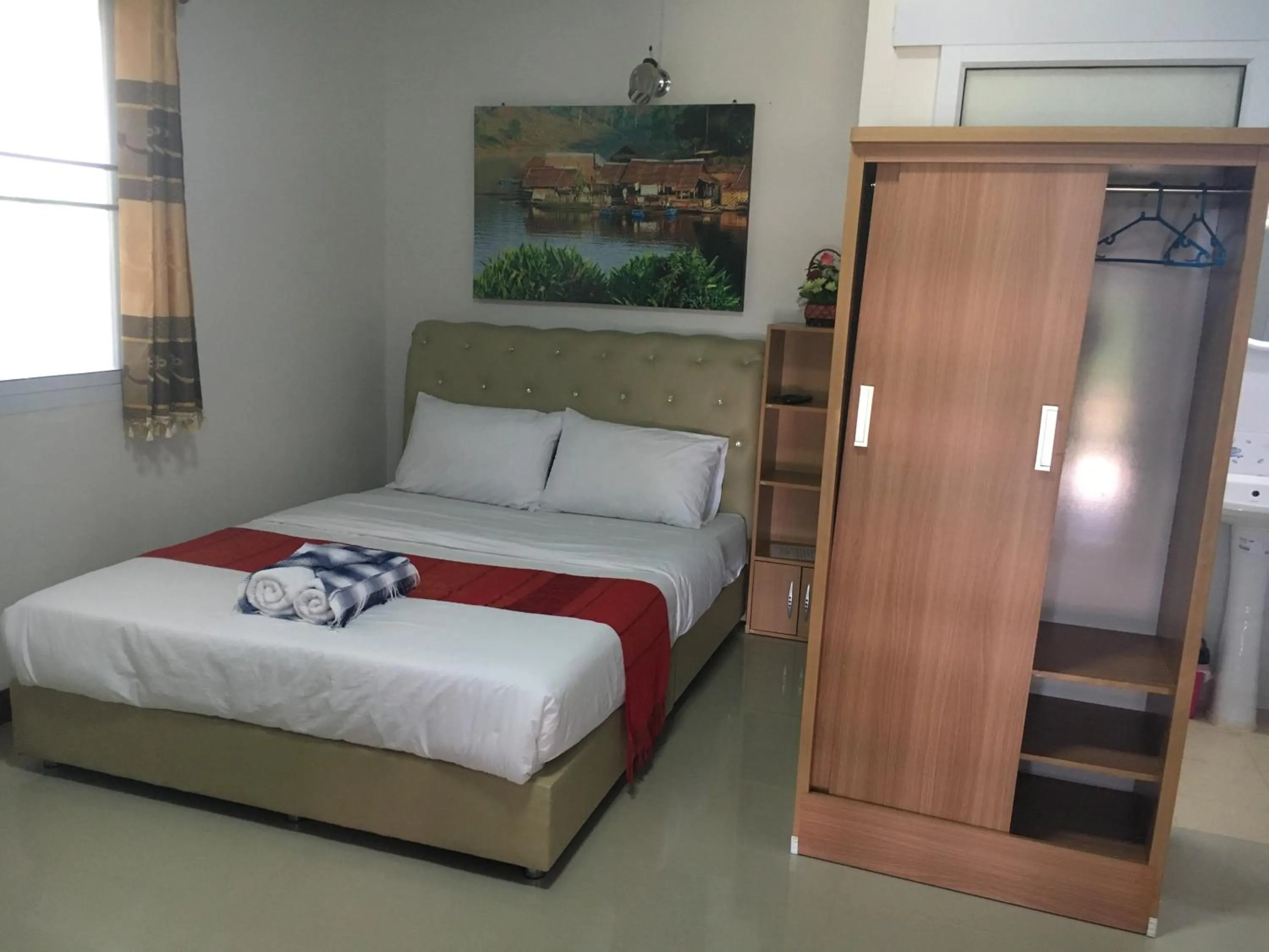 Bed in บุญจินดา รีสอร์ท