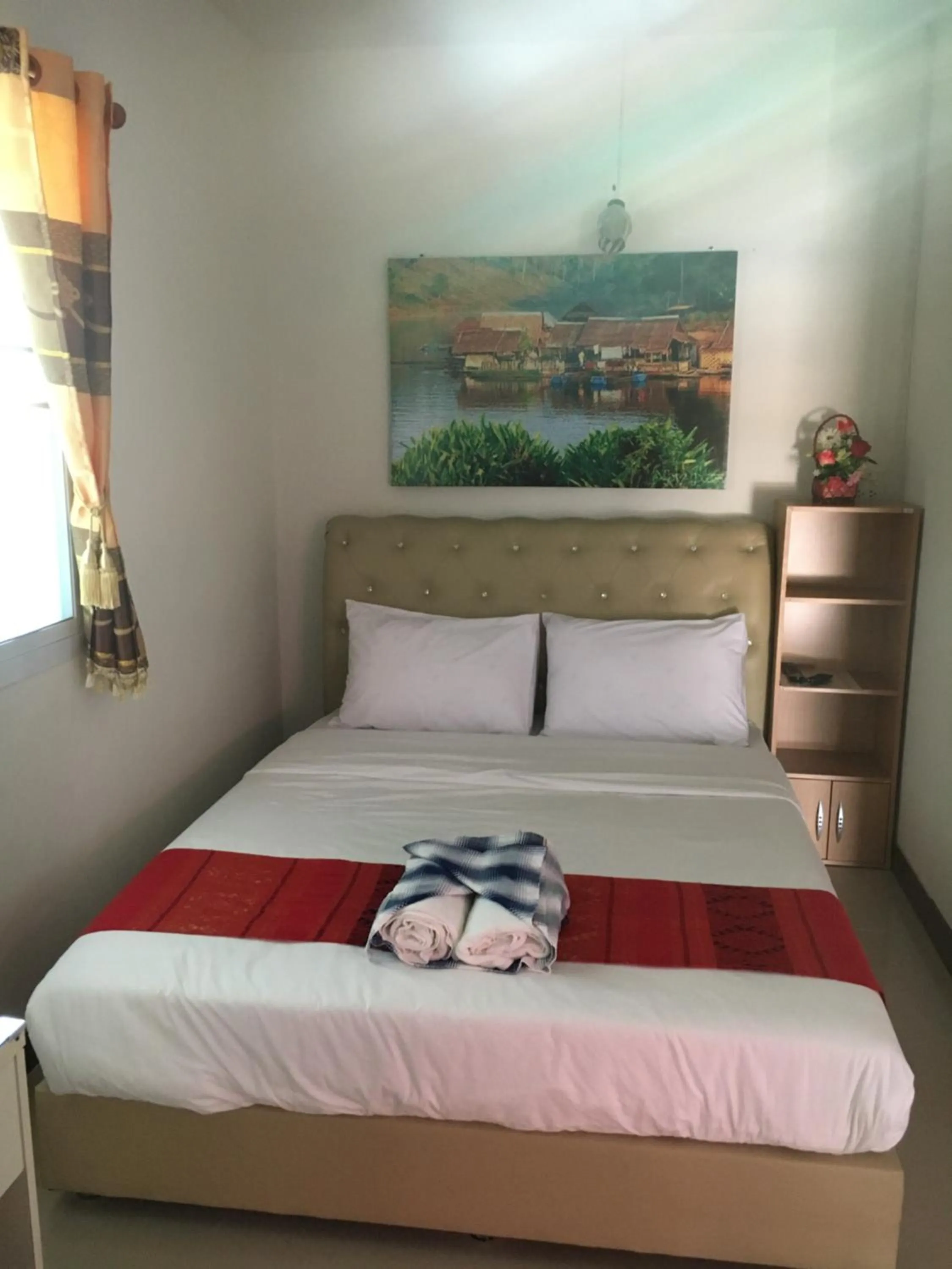 Bed in บุญจินดา รีสอร์ท