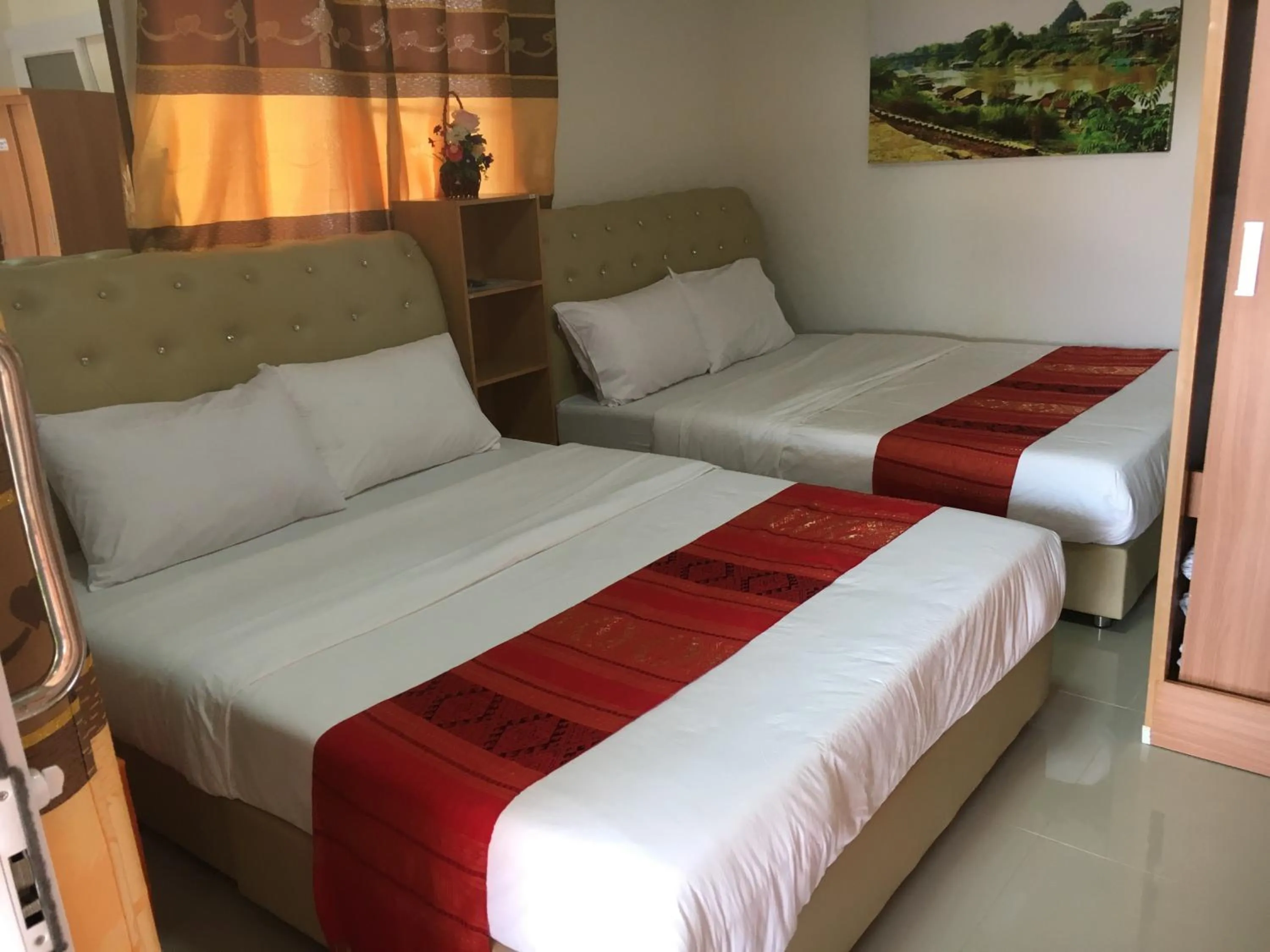 Bed in บุญจินดา รีสอร์ท