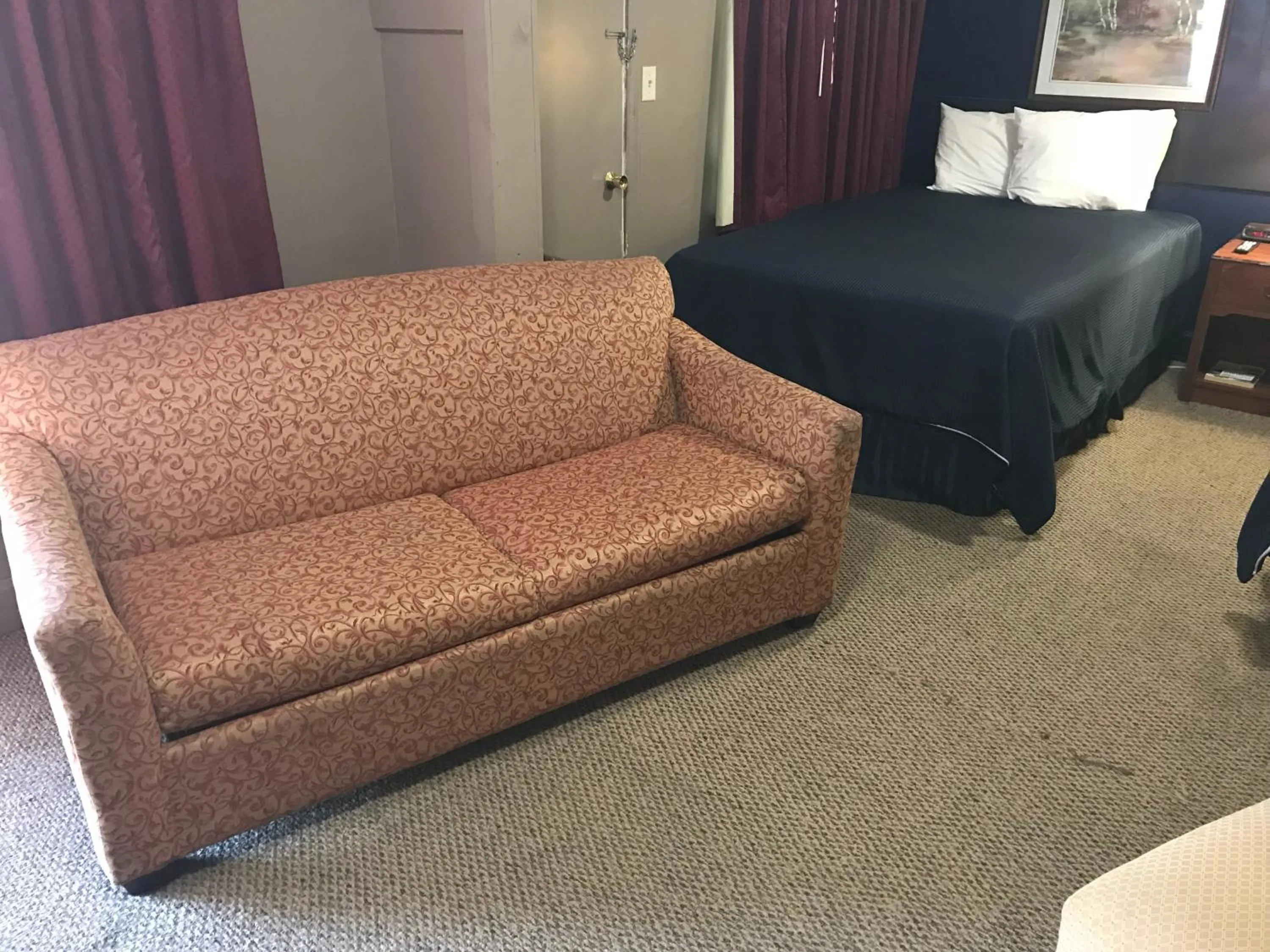 Bed in Cooper Motel Tuscola