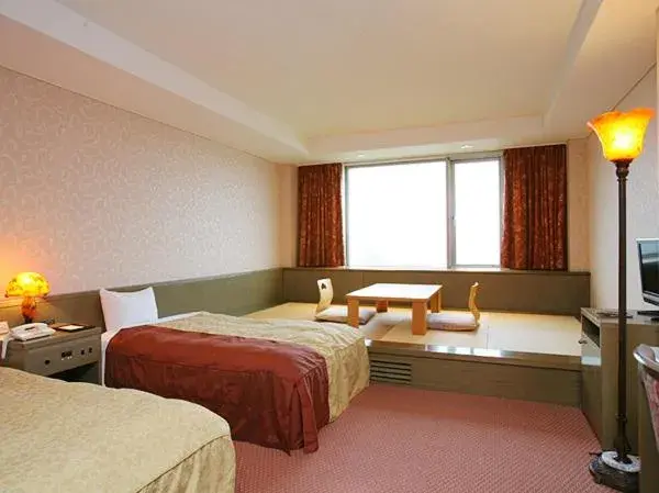 Bed in Kiyosato Kogen Hotel Bed in Kiyosato Kogen Hotel