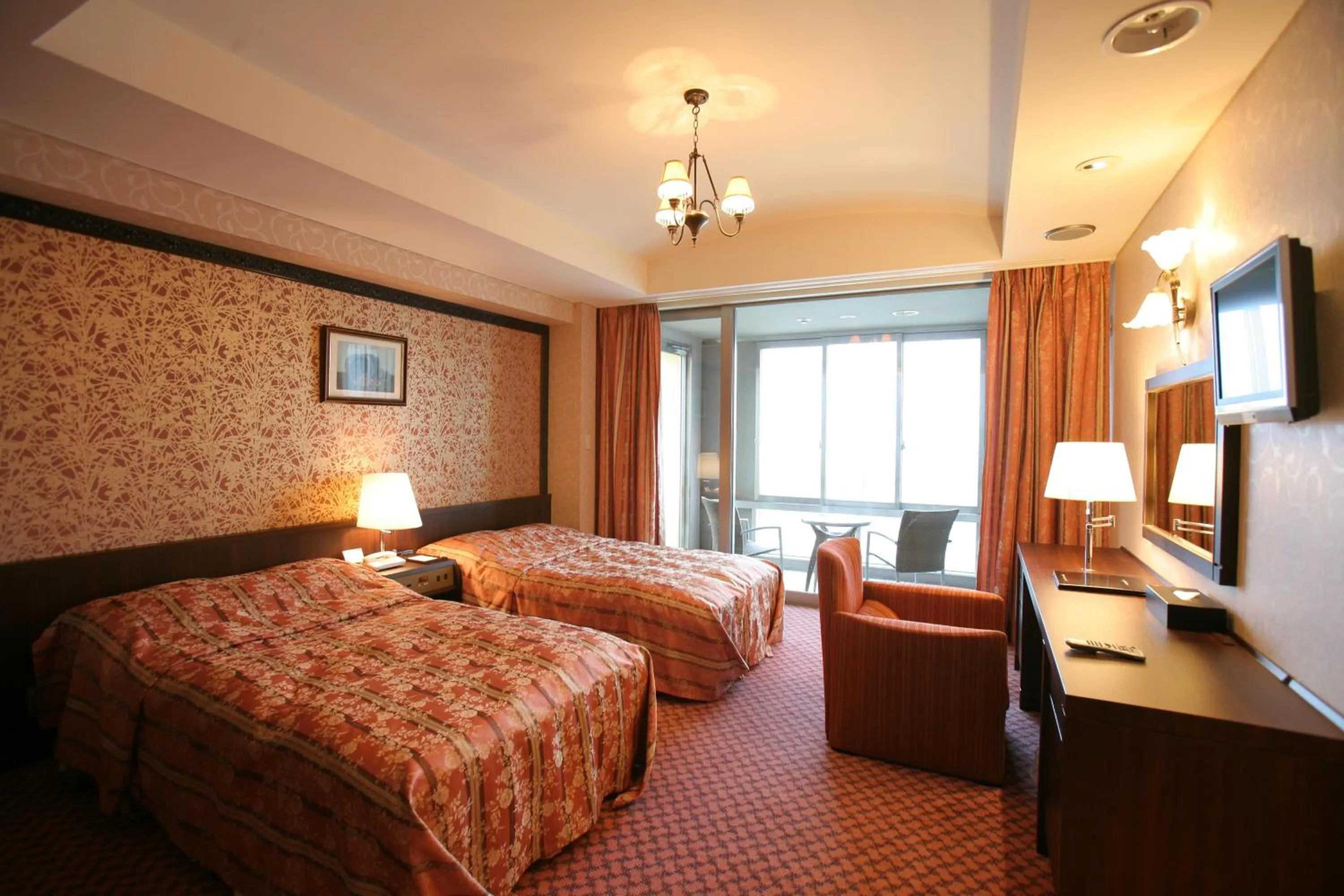 Bed in Izumigo Kiyosato Kogen Hotel