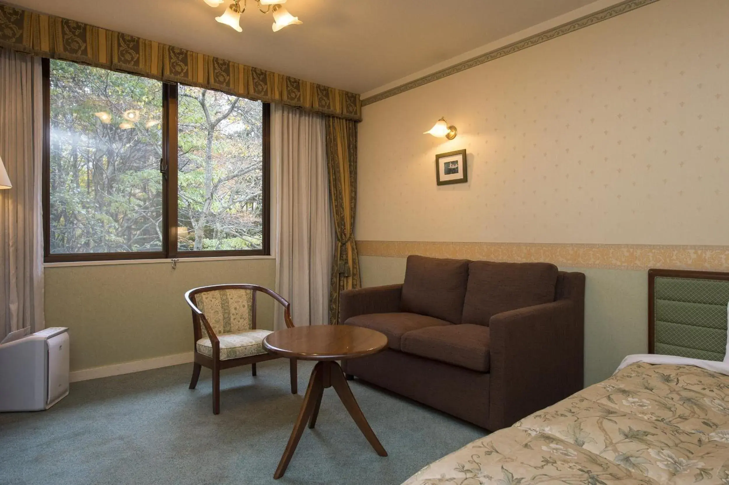 Bed in Wan Wan Paradise Takayama Bed in Wan Wan Paradise Takayama