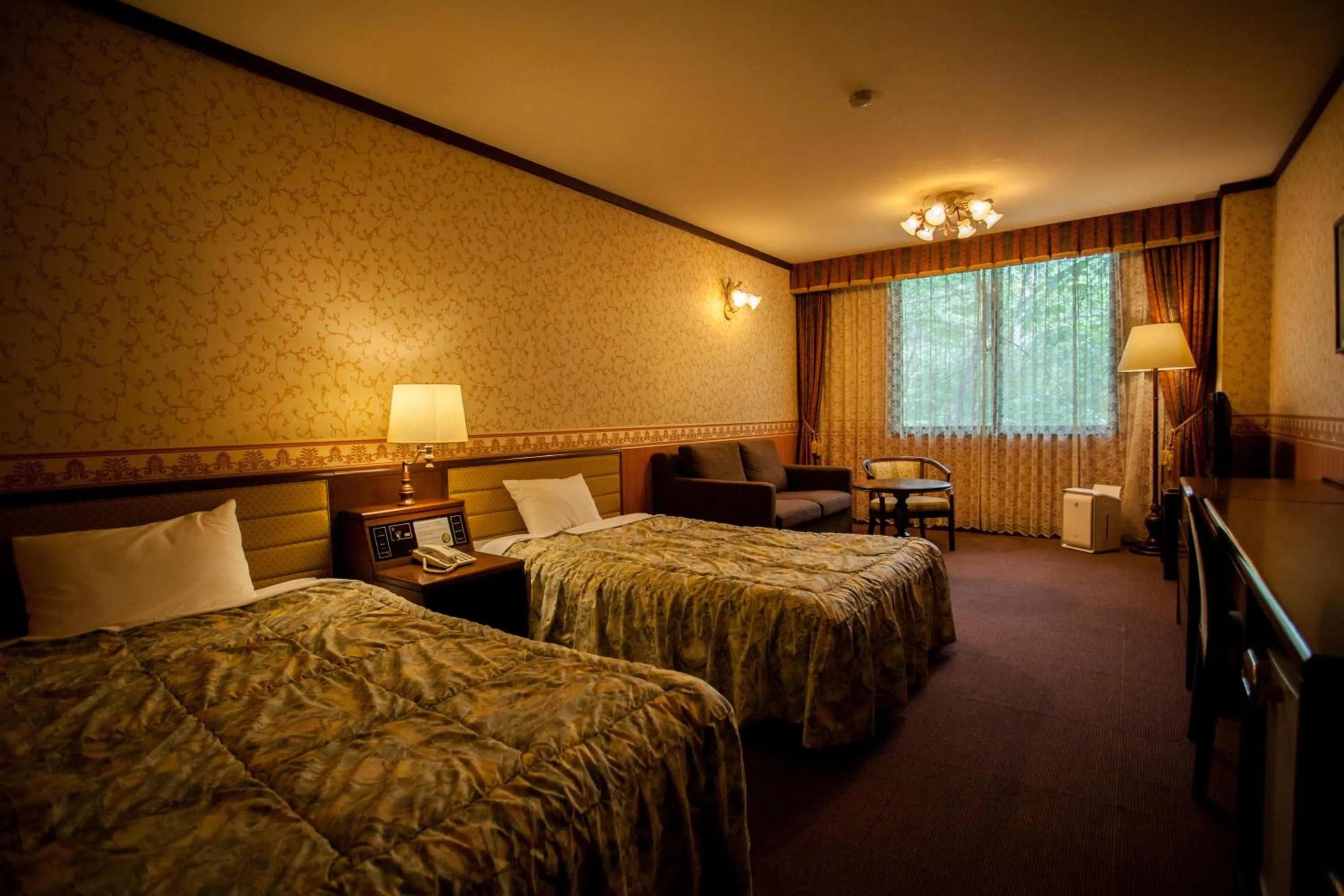 Photo of the whole room, Bed in Takayama Wan Wan Paradise Hotel & Cottage