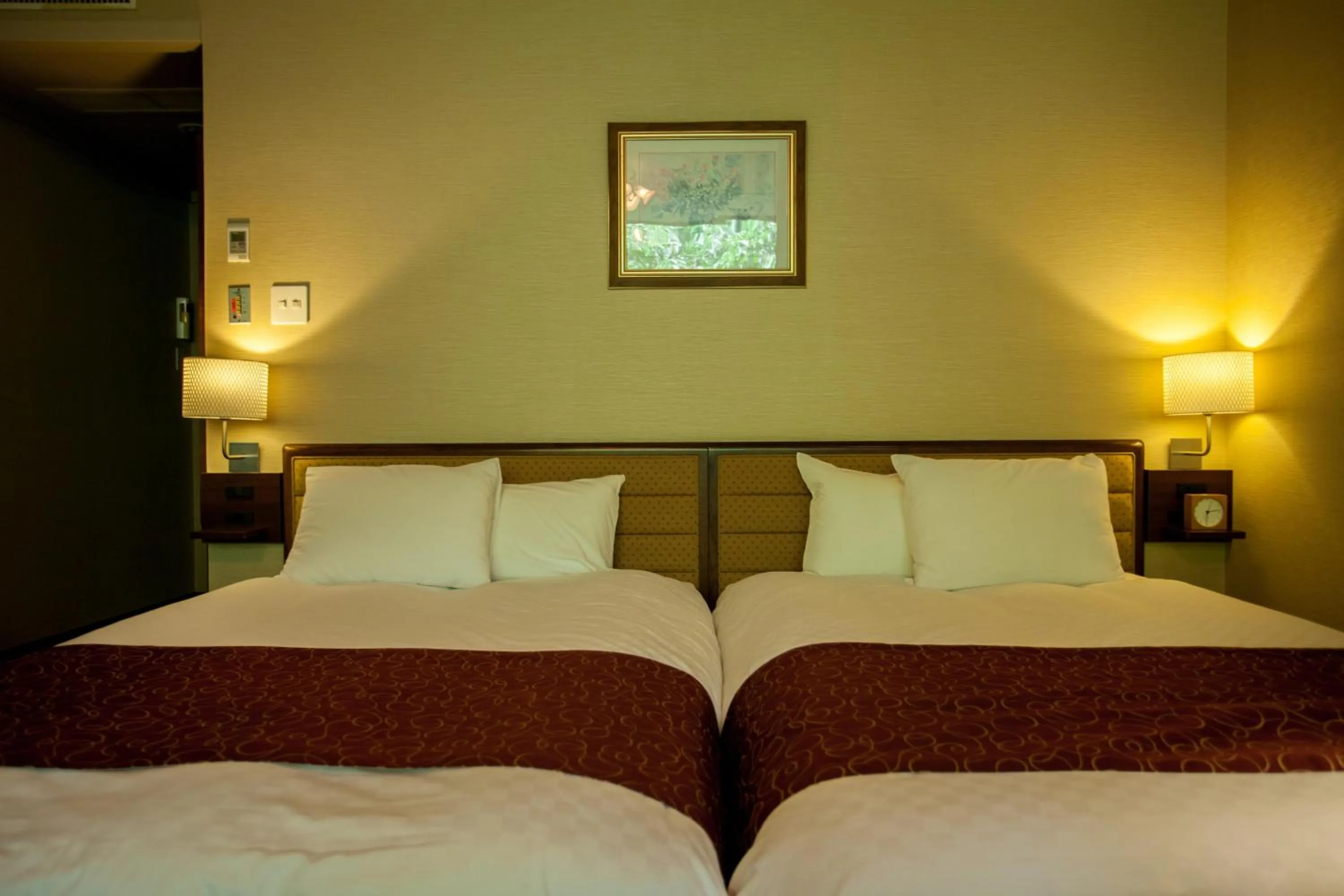 Bed in Takayama Wan Wan Paradise Hotel & Cottage