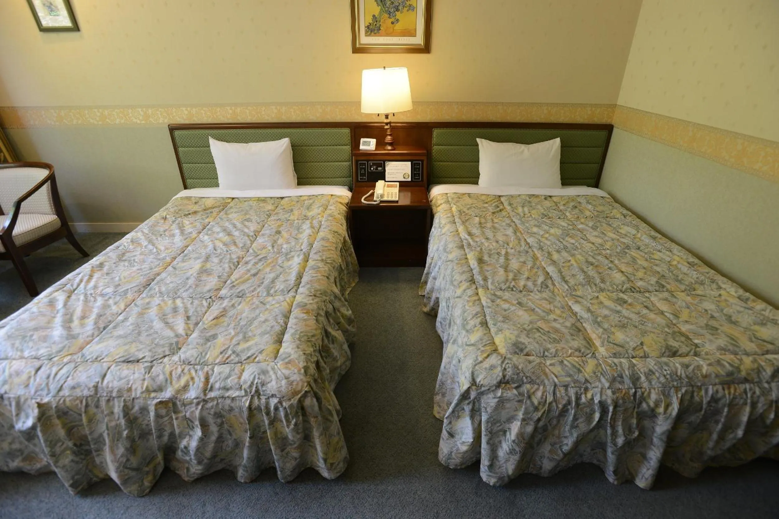 Bed in Takayama Wan Wan Paradise Hotel & Cottage