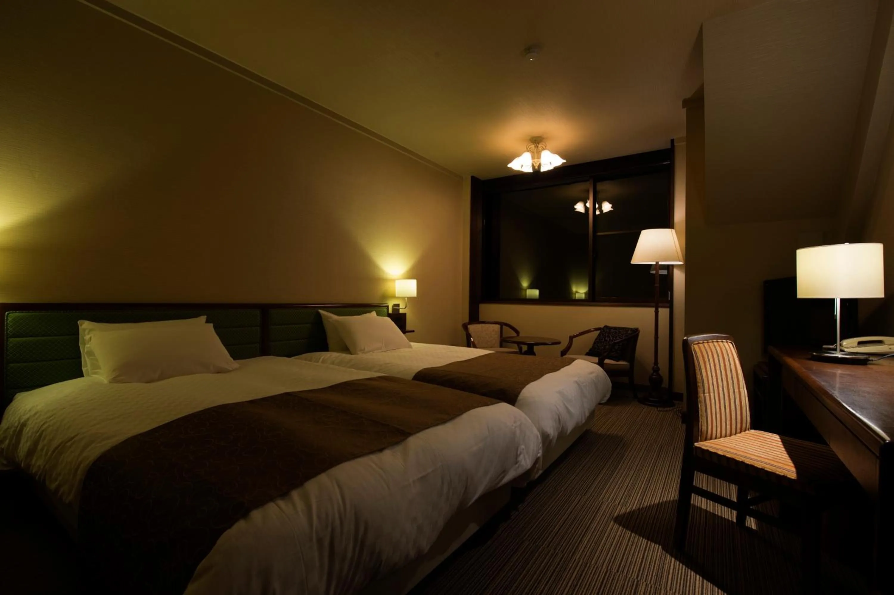 Photo of the whole room, Bed in Takayama Wan Wan Paradise Hotel & Cottage