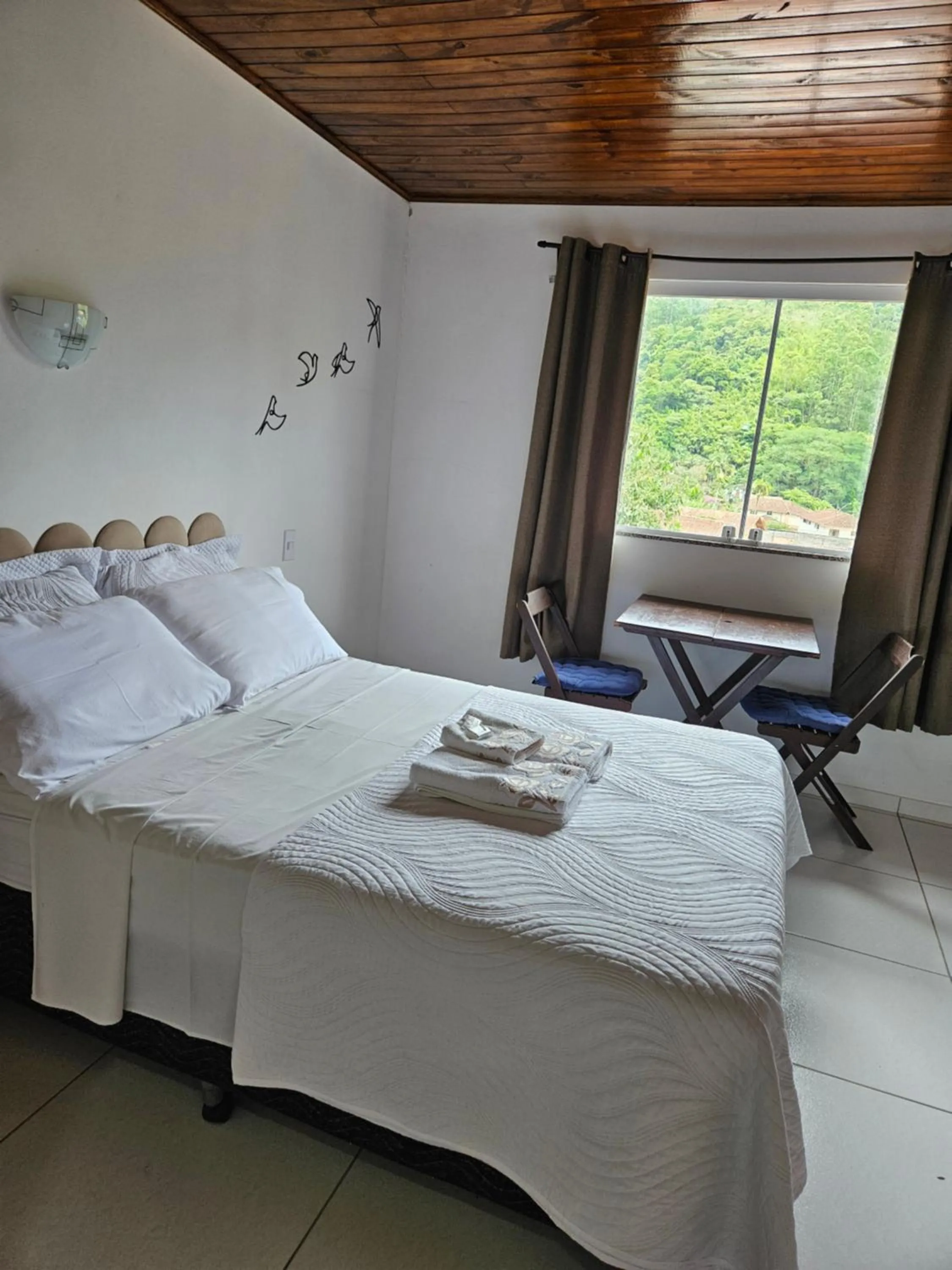 Bed in Pousada Bem Te Vi Lumiar