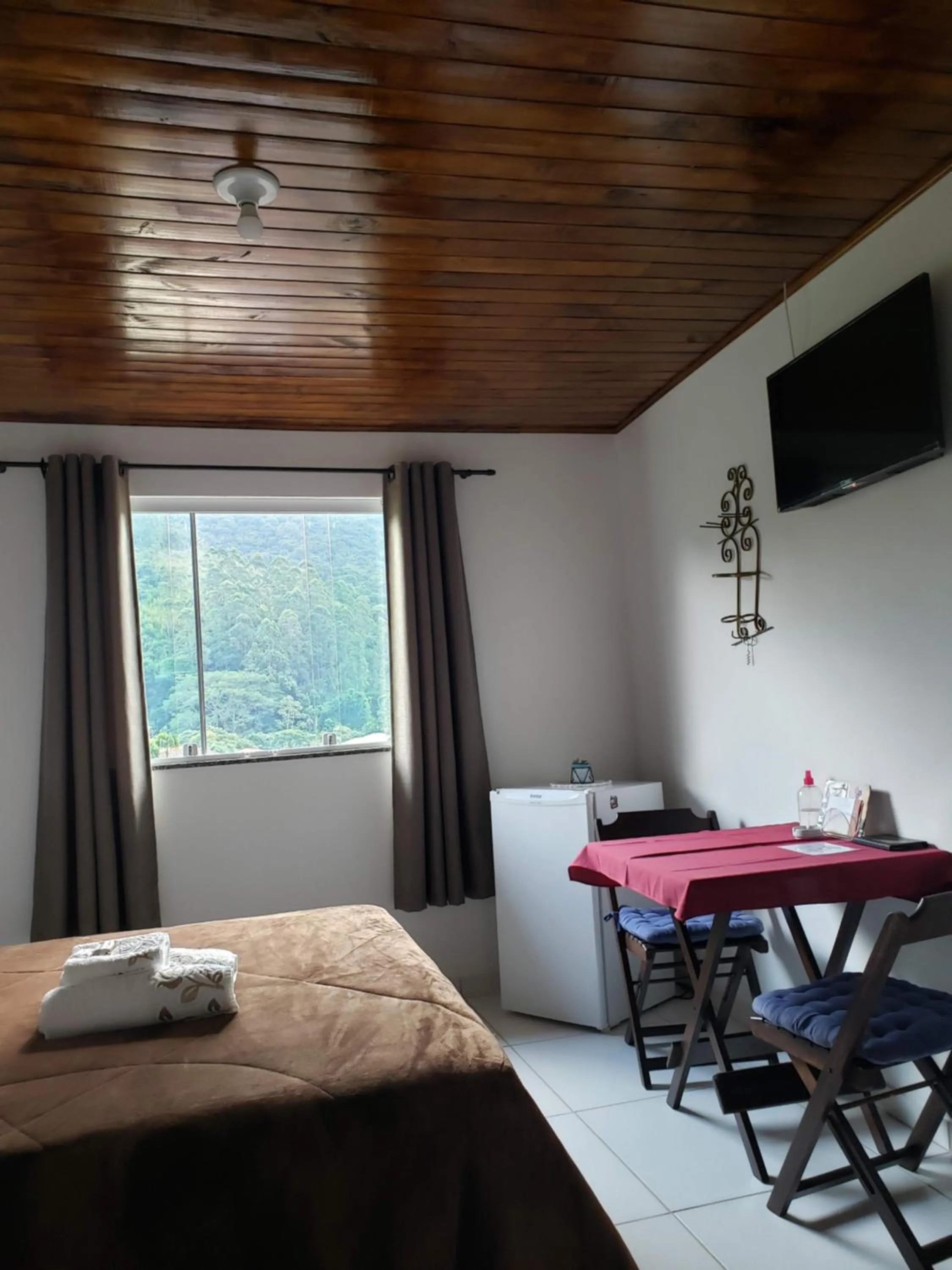 TV and multimedia in Pousada Bem Te Vi Lumiar