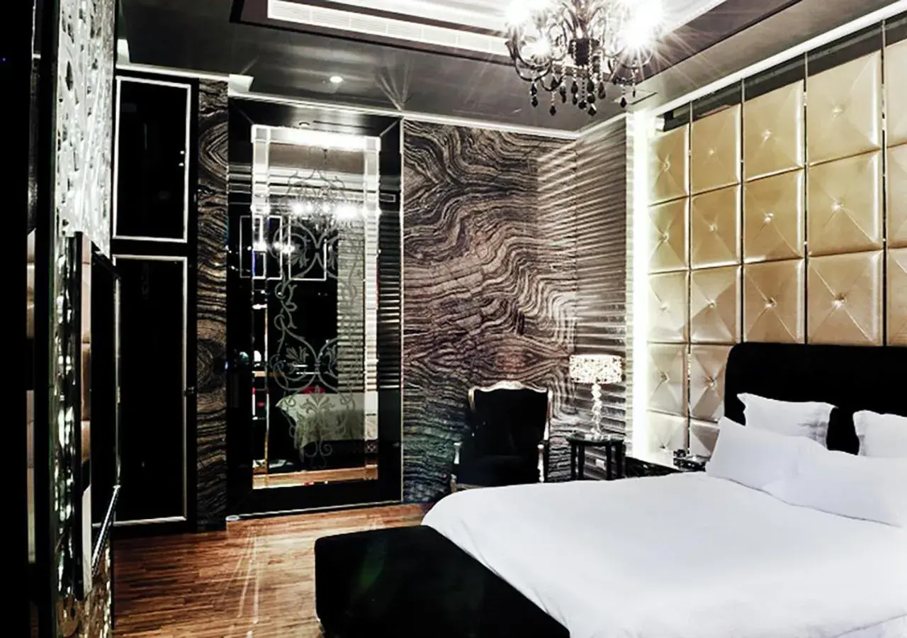 Bed in Royal Group Motel Ming Zu Branch Bed in Royal Group Motel Ming Zu Branch