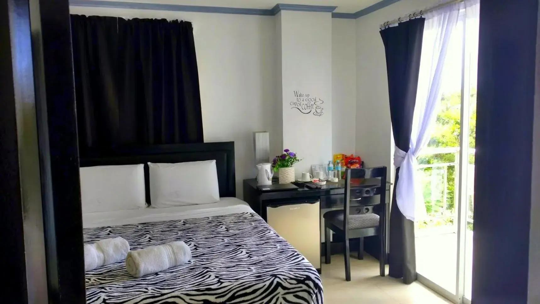 Garden view, Bed in Bohol South Beach Hotel Garden view, Bed in Bohol South Beach Hotel