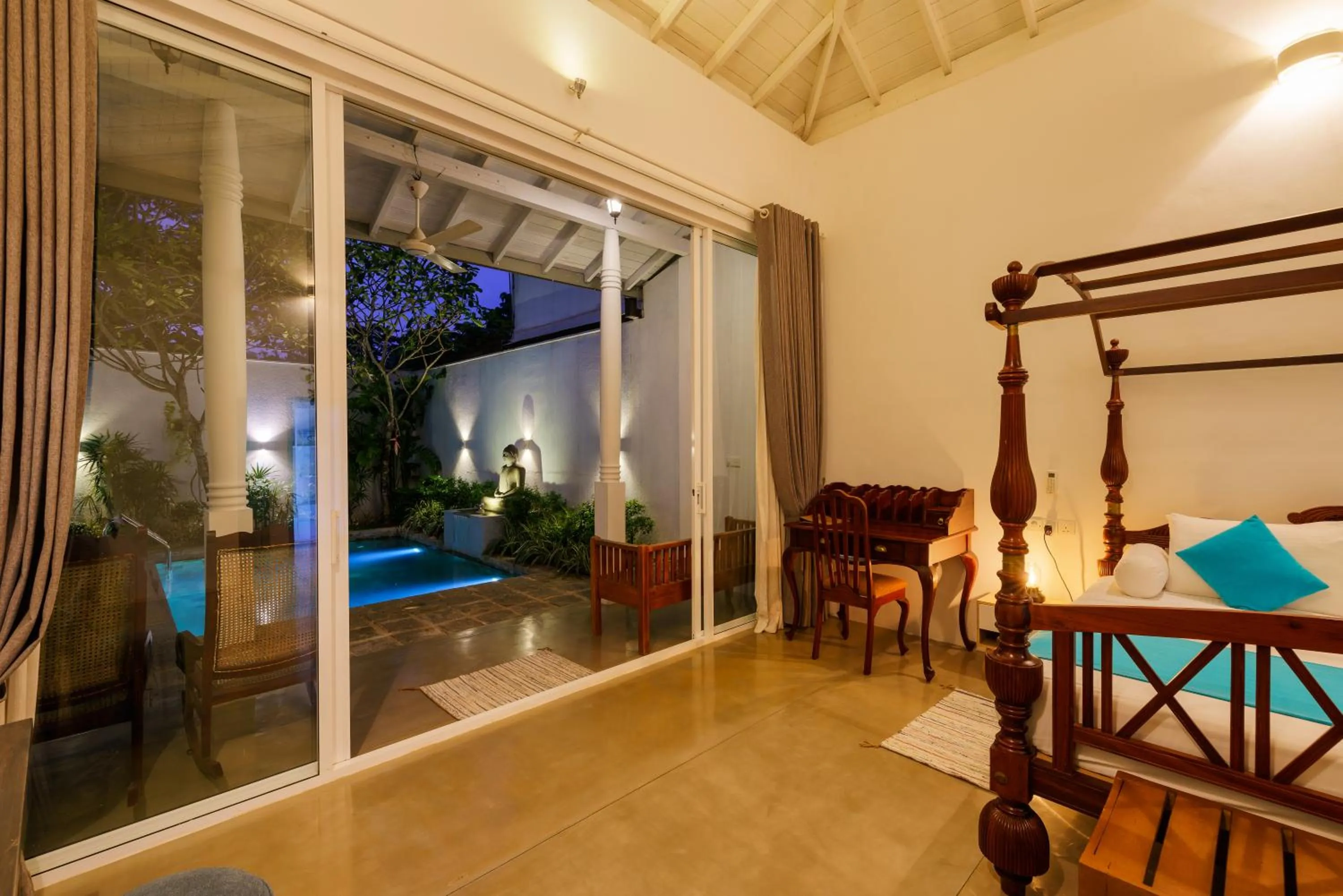 Photo of the whole room, Bed in Angam Villas Colombo