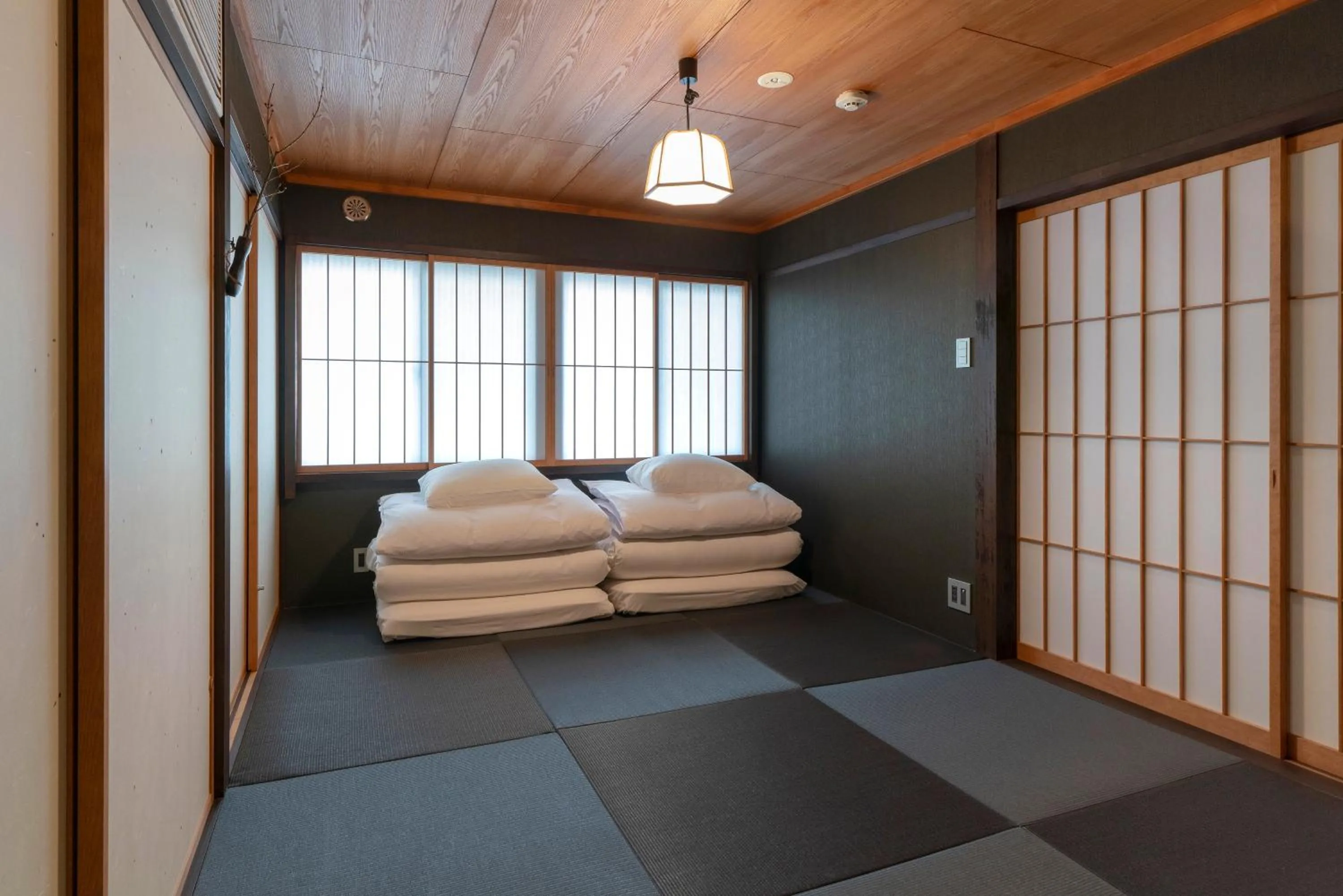 Bedroom, Bed in Ainotsuji Machiya House