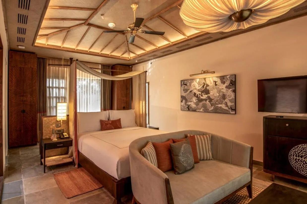 Seating area, Bed in Taj Sawai,Ranthambore