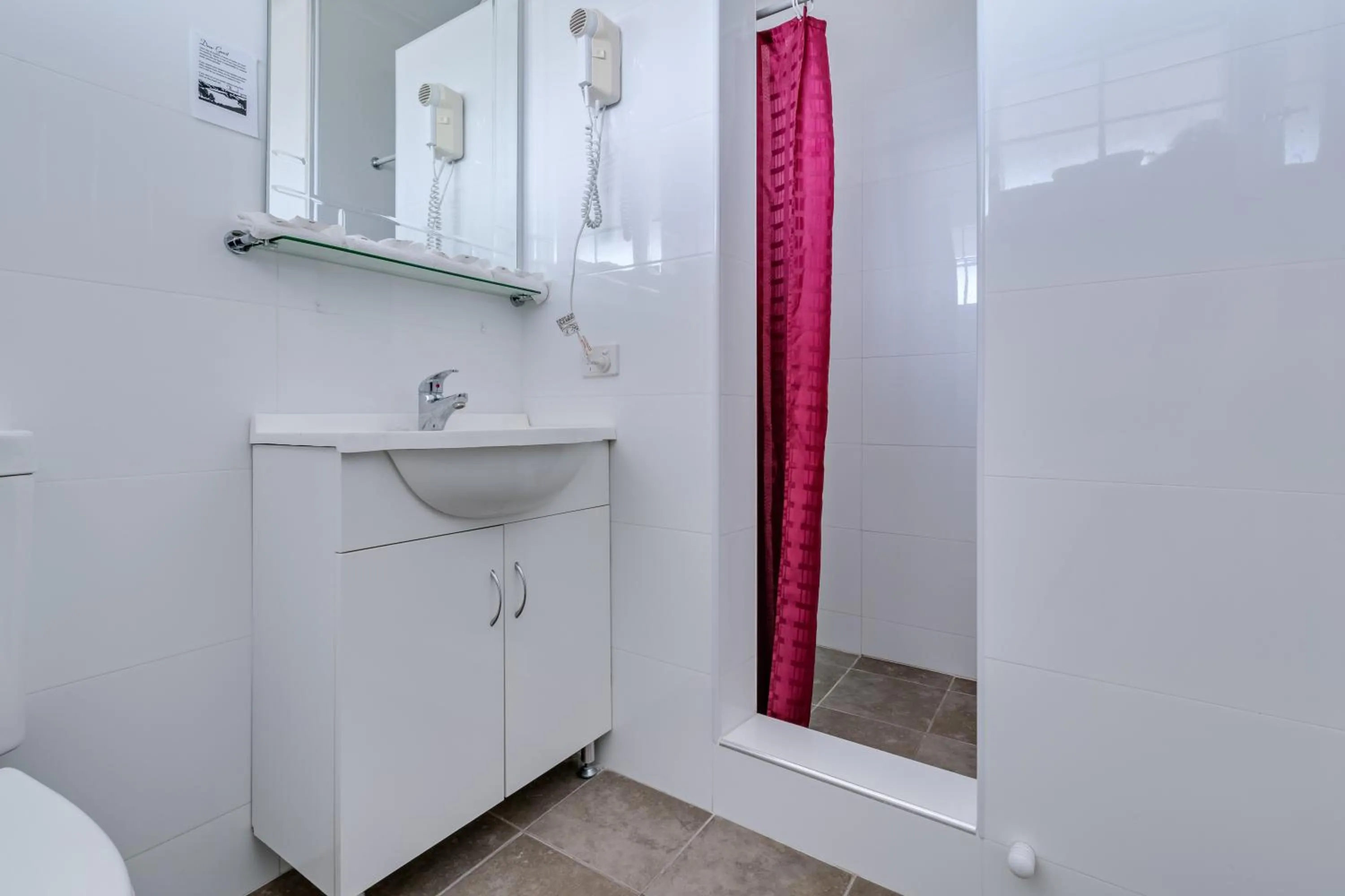 Shower in ibis Styles Albany