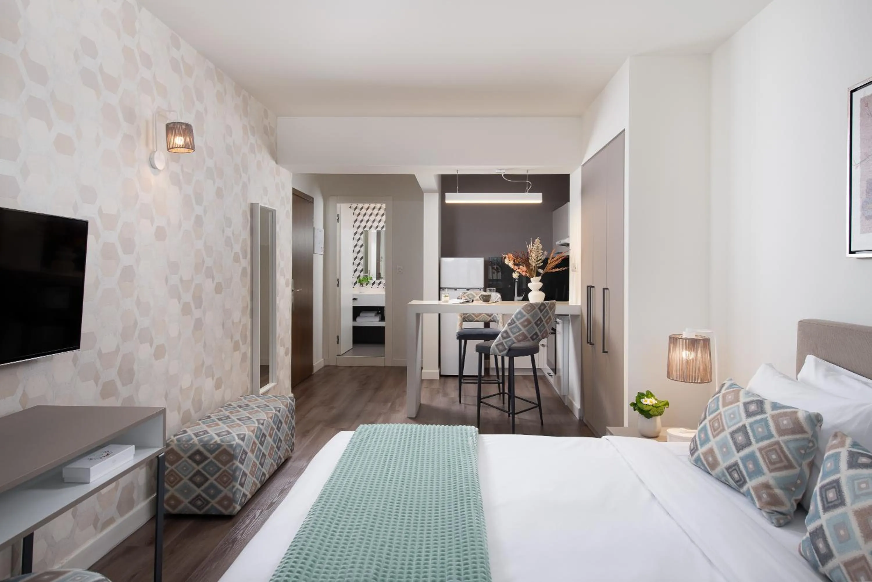 Bed in Urban Nest - Suites & Apartments