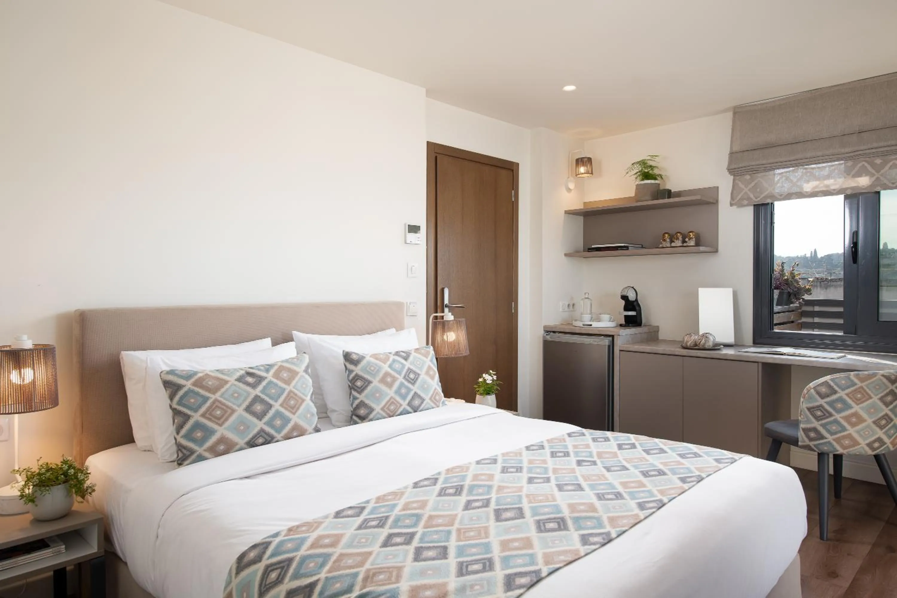 Bed in Urban Nest - Suites & Apartments