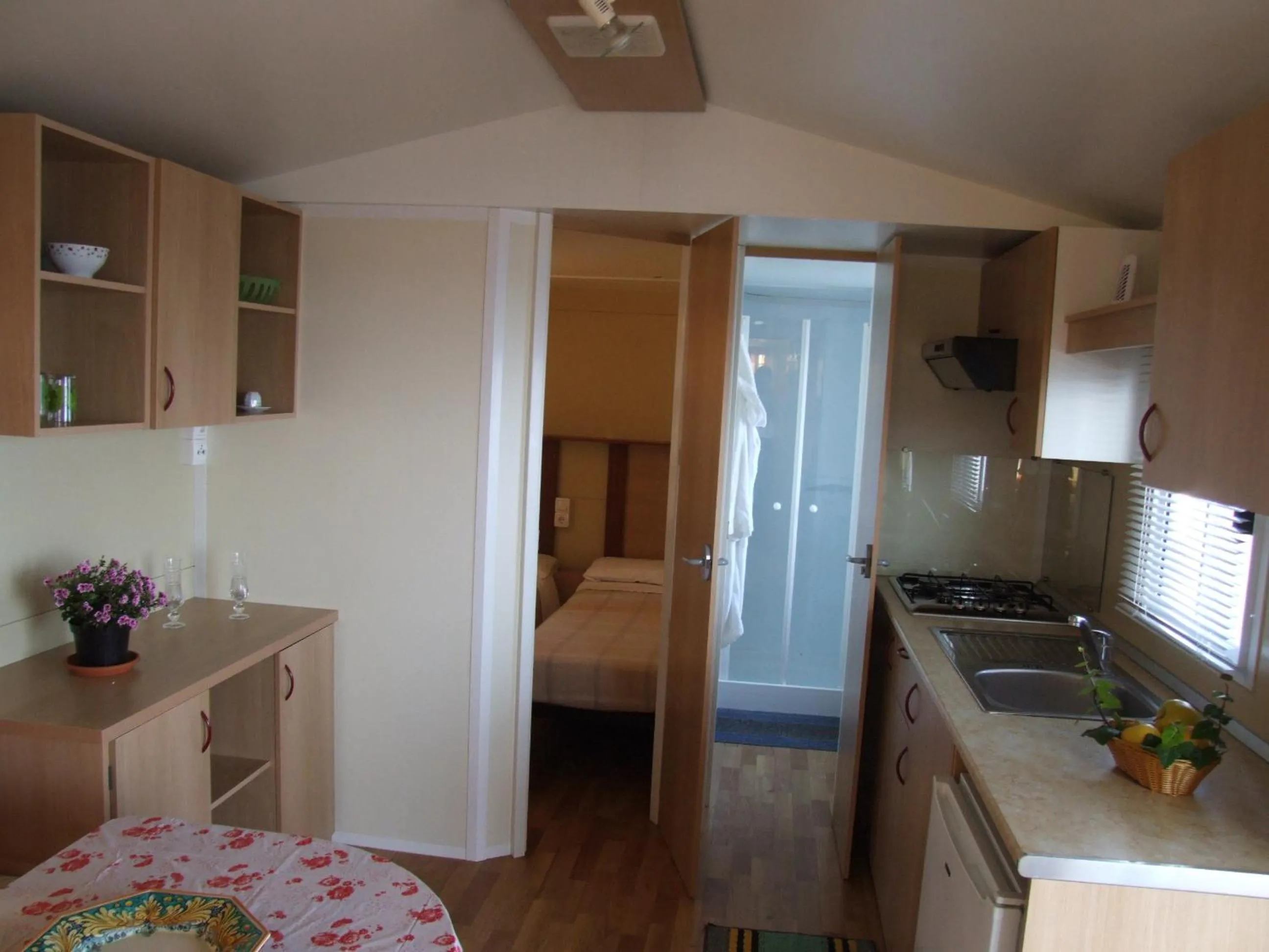 Kitchen or kitchenette, Bed in Camping Jonio
