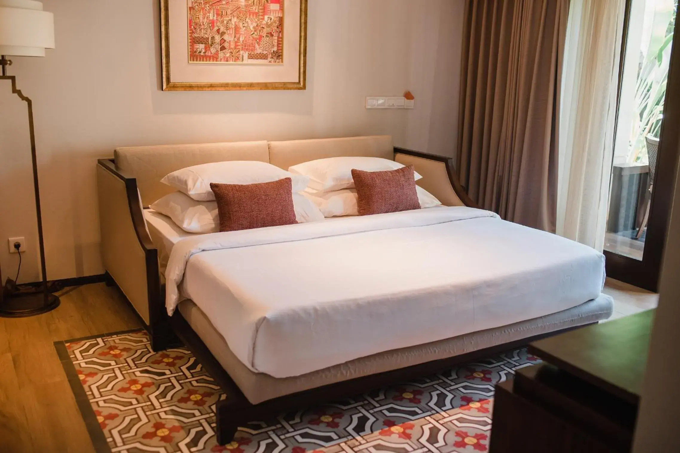 Bed in Ramayana Suites and Resort