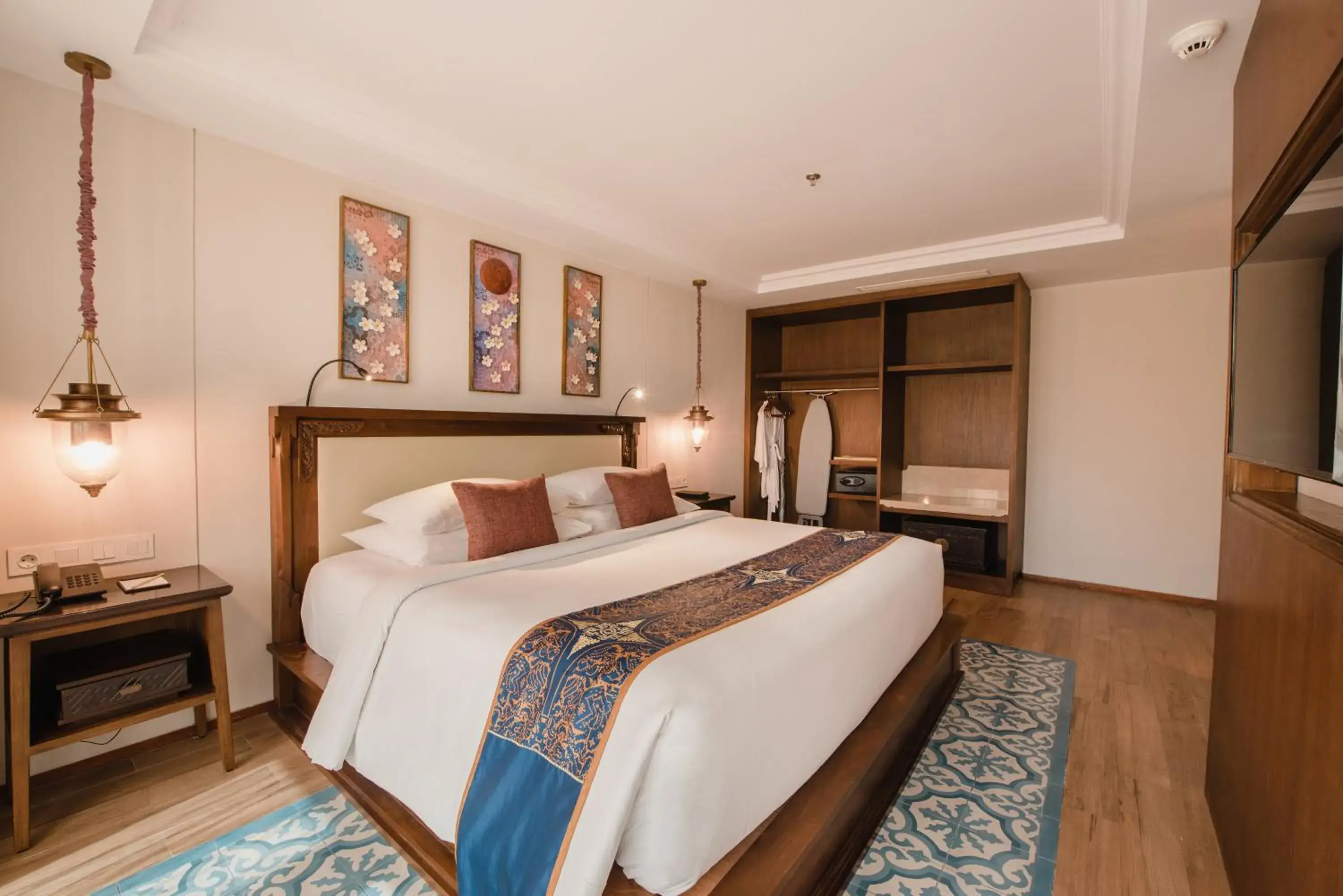 Bed in Ramayana Suites and Resort