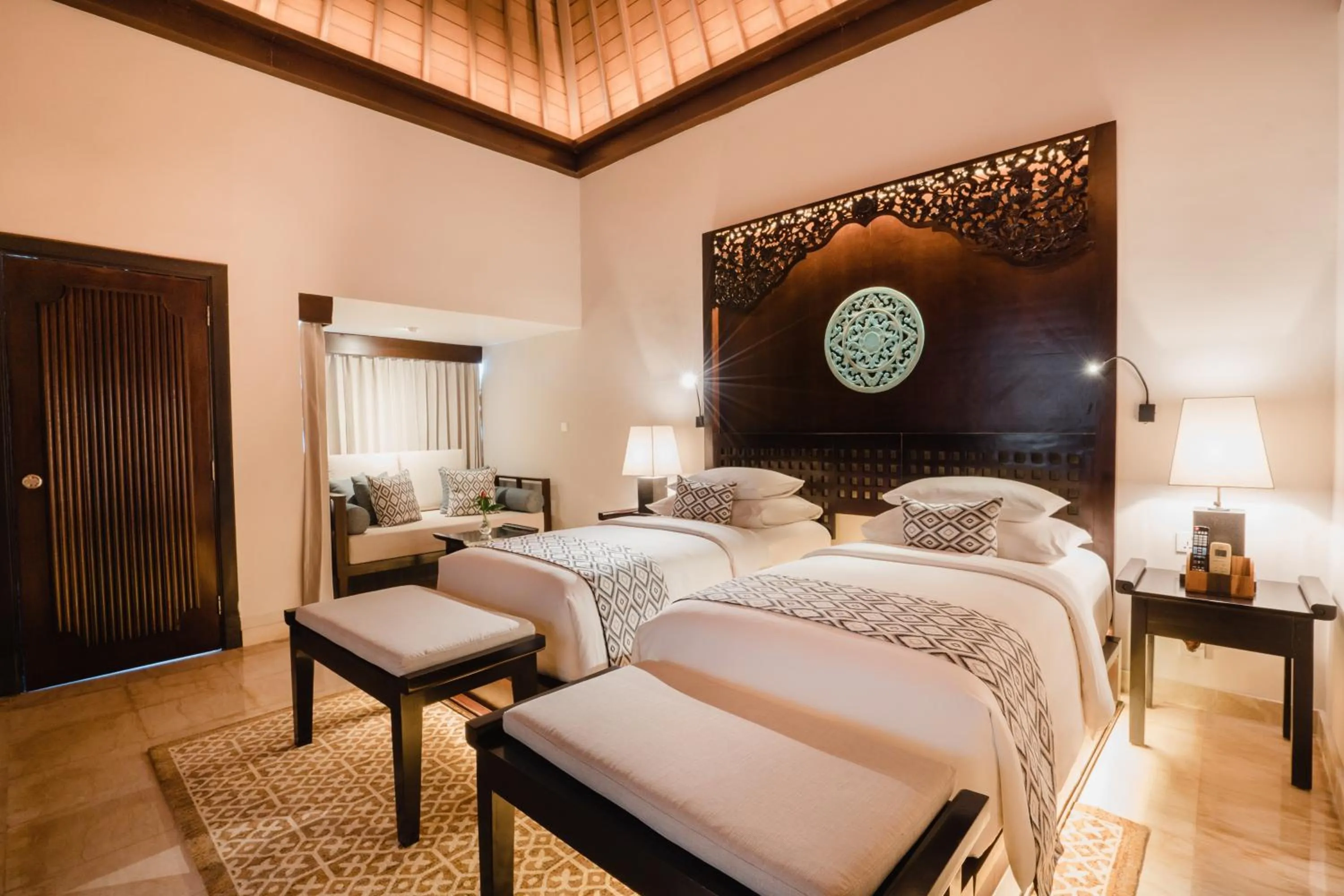 Bed in Ramayana Suites and Resort