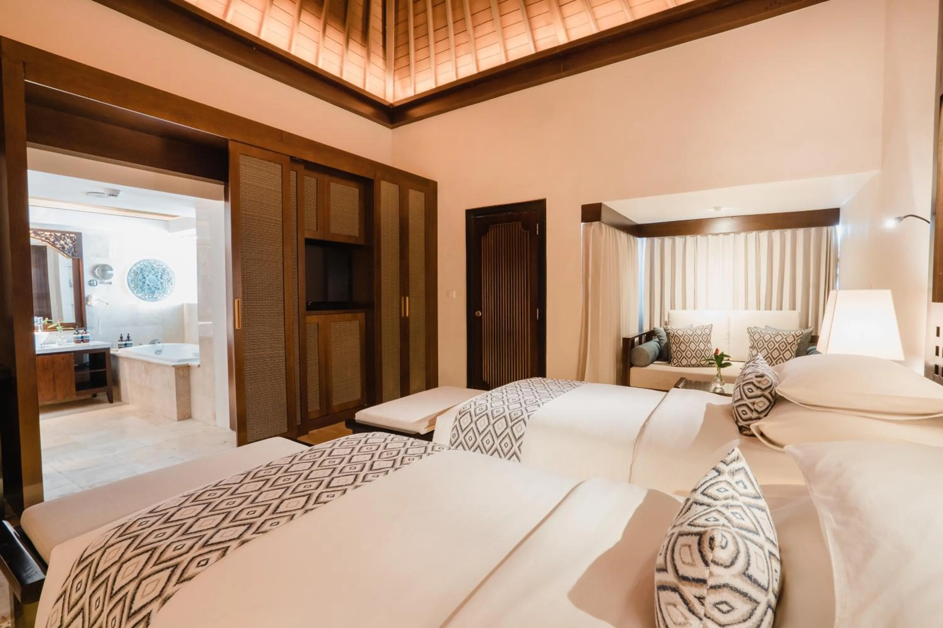 Bed in Ramayana Suites and Resort