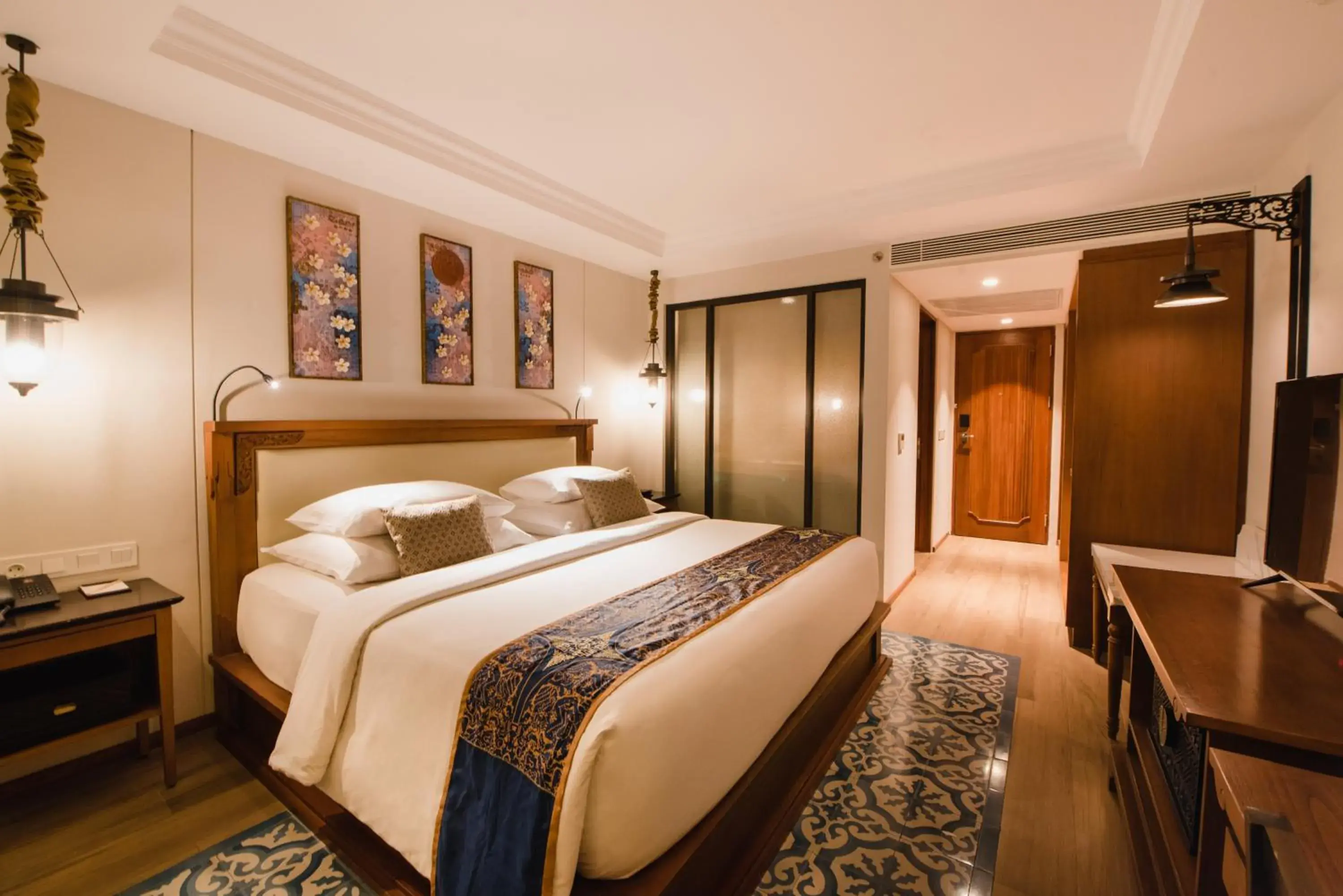 Bed in Ramayana Suites and Resort