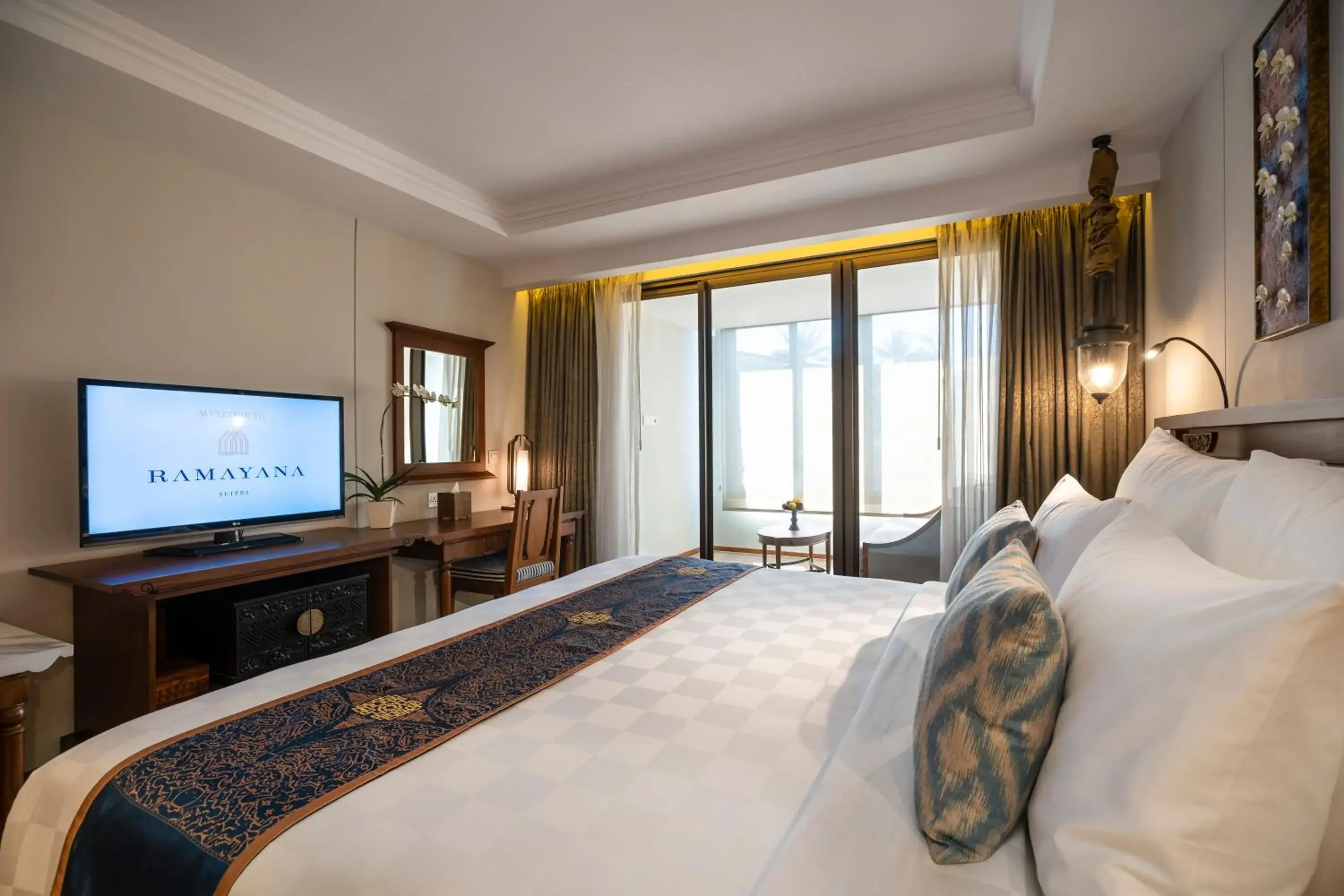 Bedroom, TV/Entertainment Center in Ramayana Suites and Resort