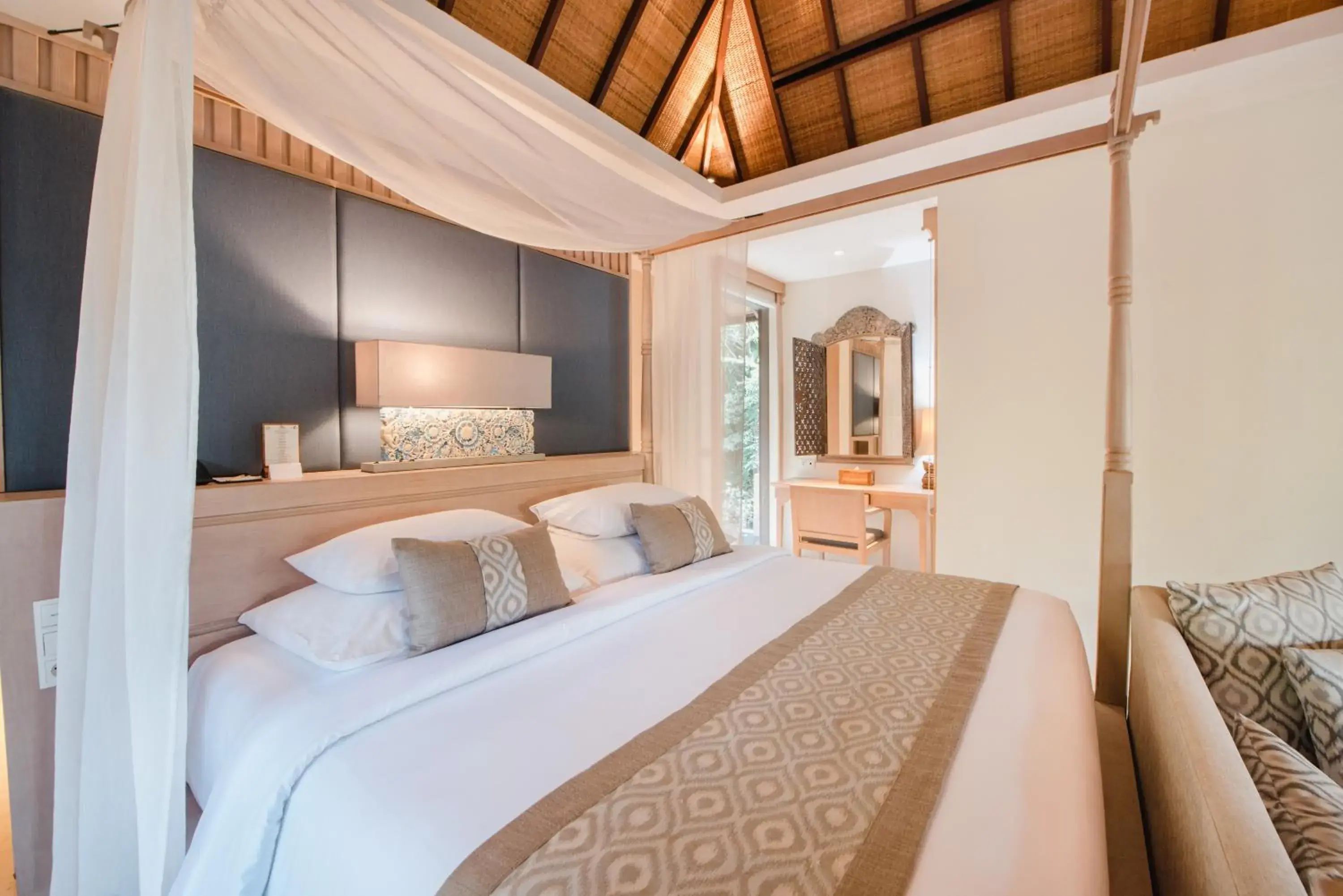 Bed in Ramayana Suites and Resort