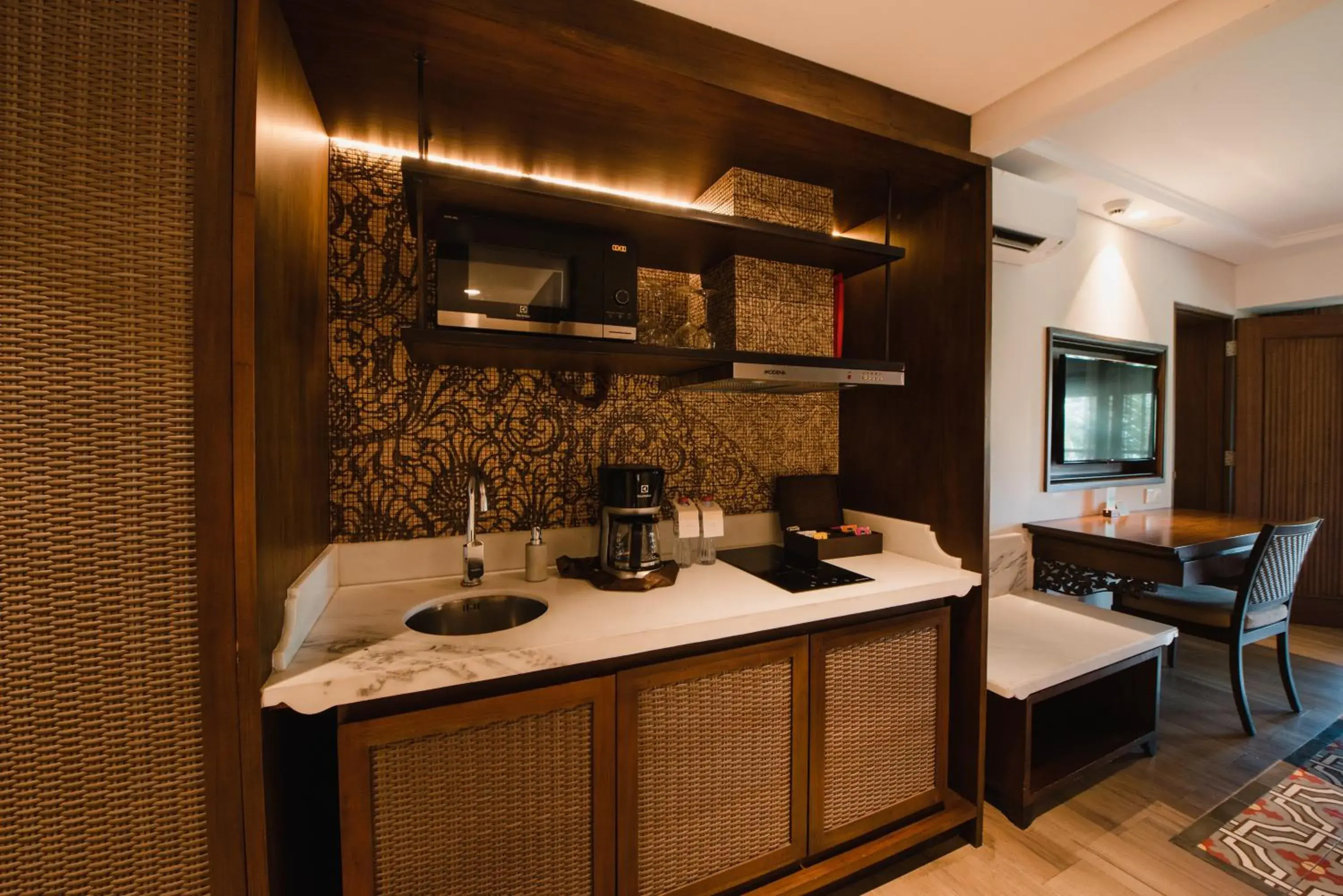 Kitchen or kitchenette, Bathroom in Ramayana Suites and Resort