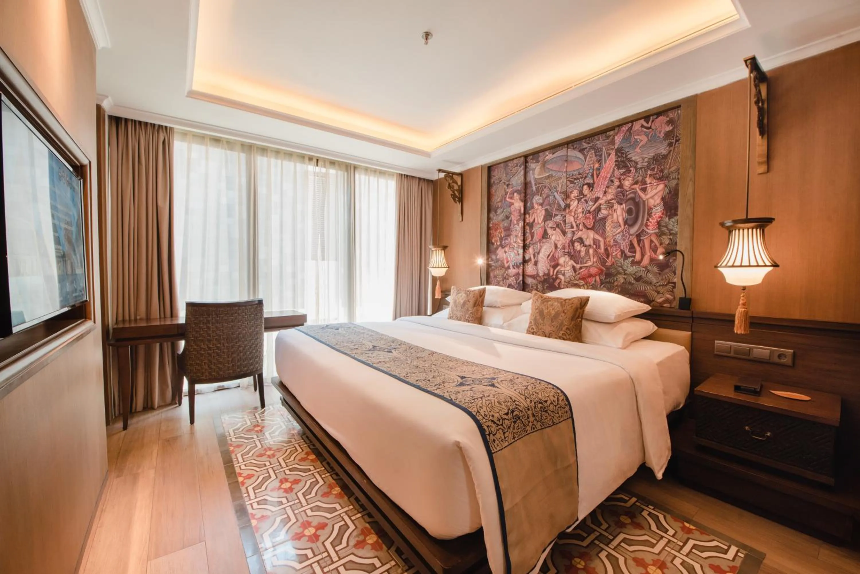 Bed in Ramayana Suites and Resort