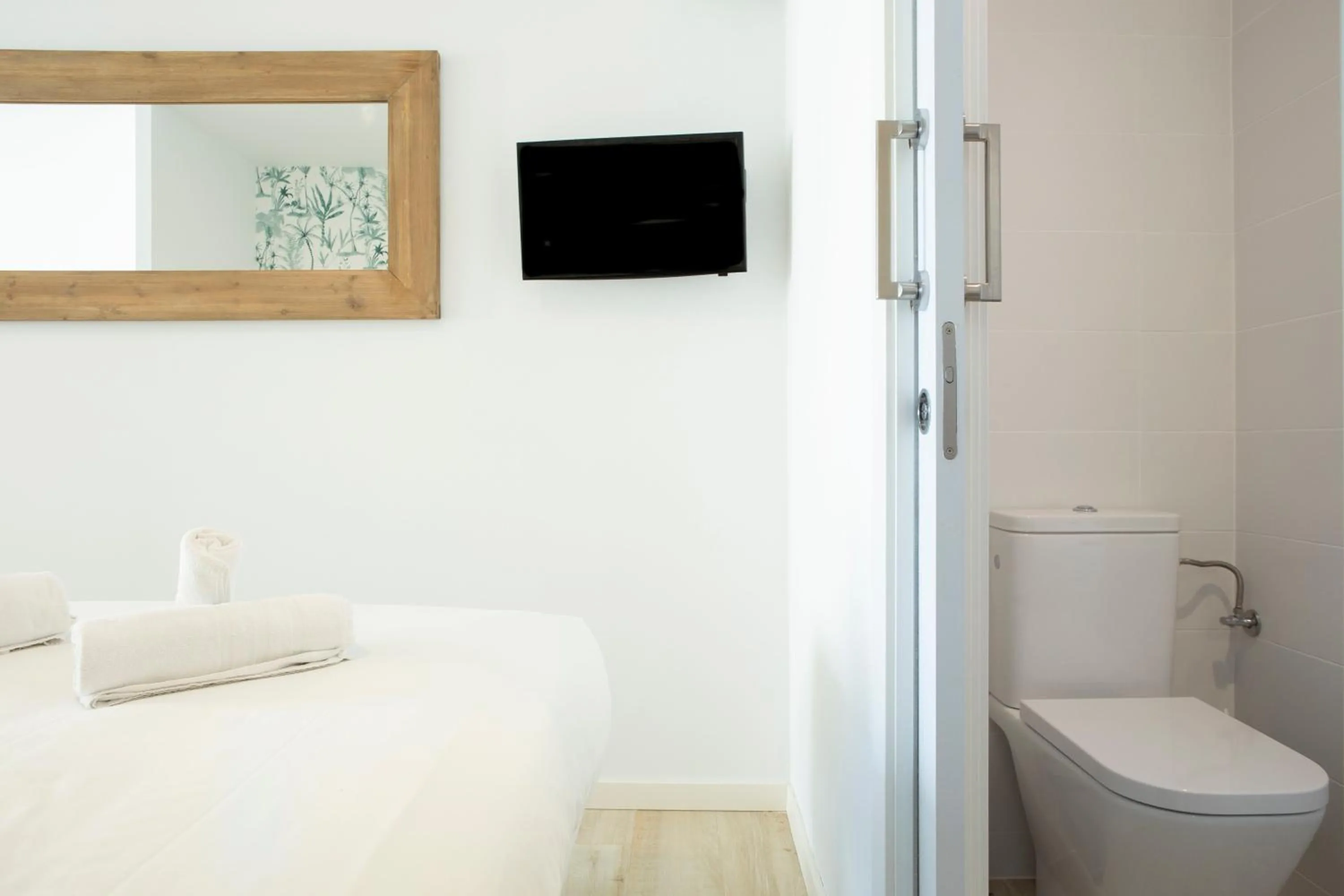 Toilet, Bed in Urban Suites Sitges Apartments by PriorityVillas