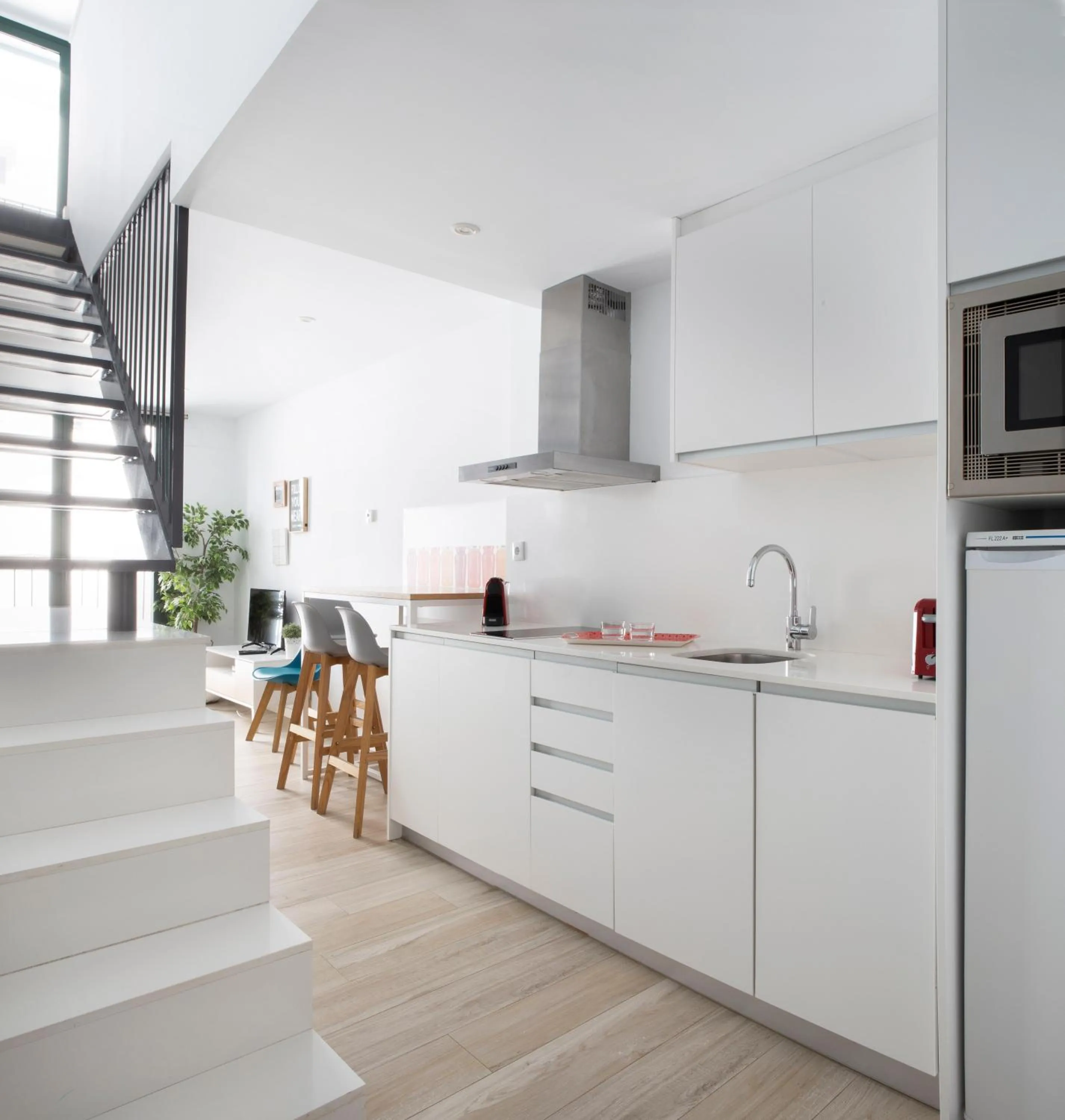 Kitchen or kitchenette in Urban Suites Sitges Apartments by PriorityVillas