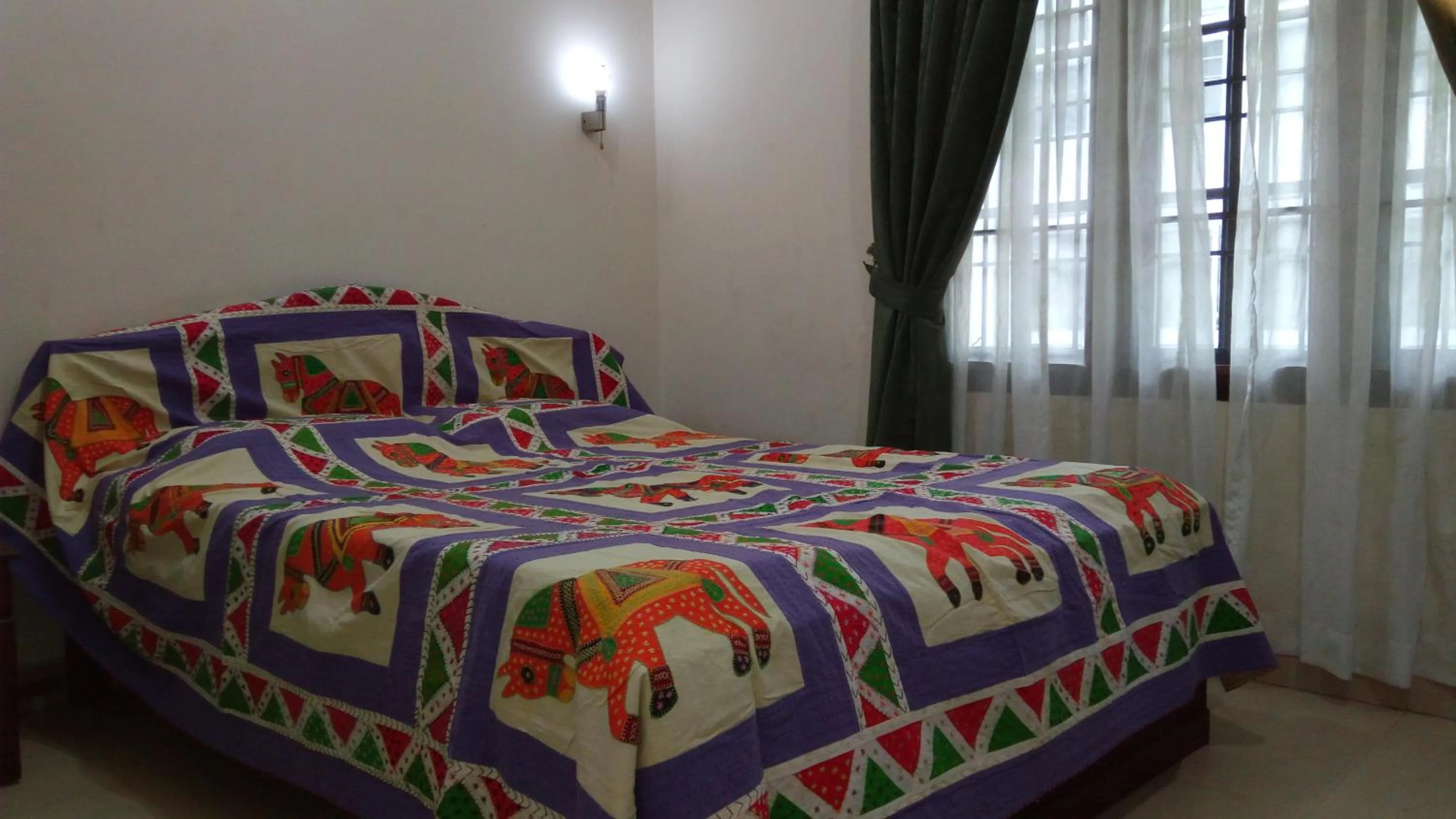 Bed in Elim Homestay Fort Kochi