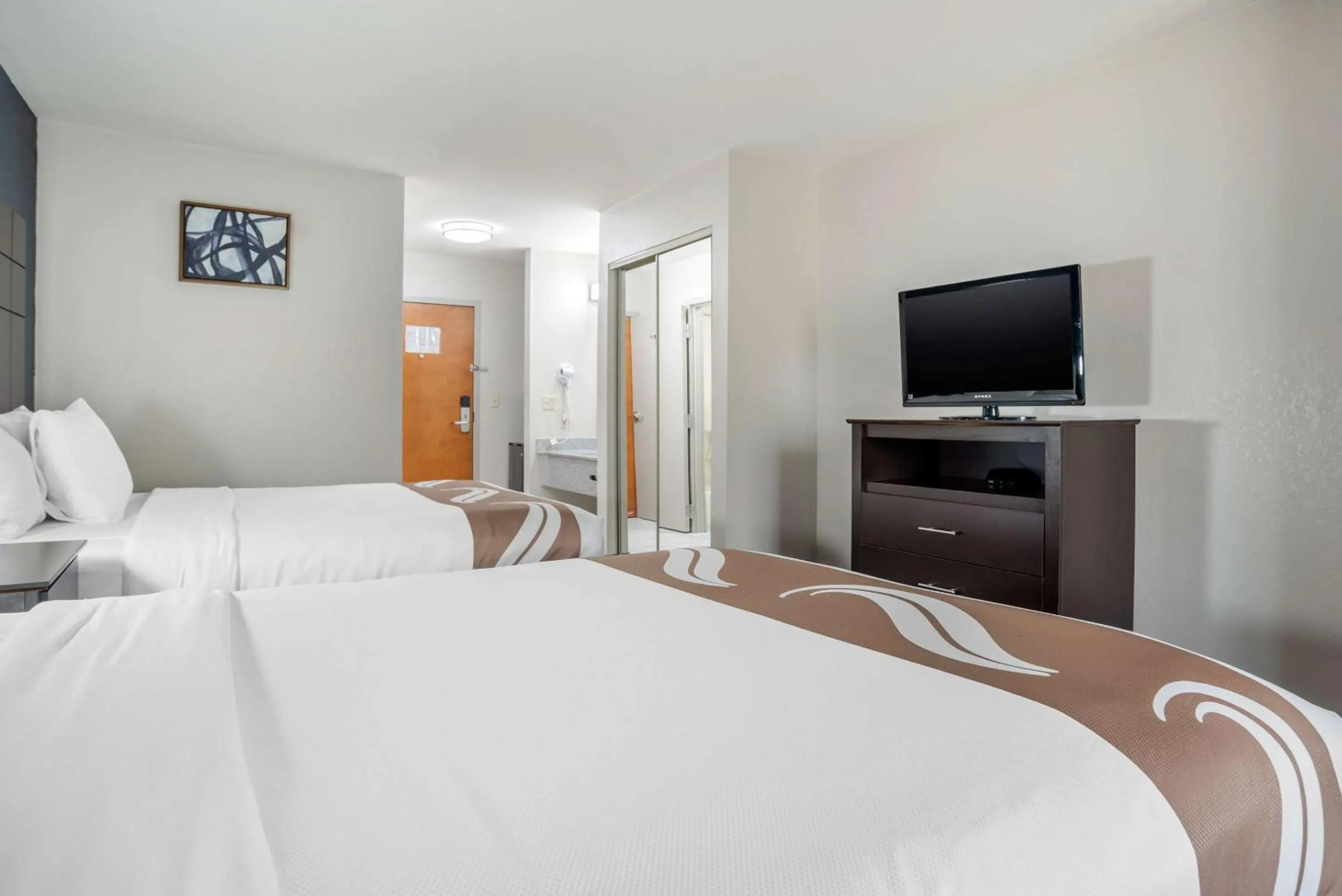 Bedroom, Bed in Quality Suites Baton Rouge East - Denham Springs