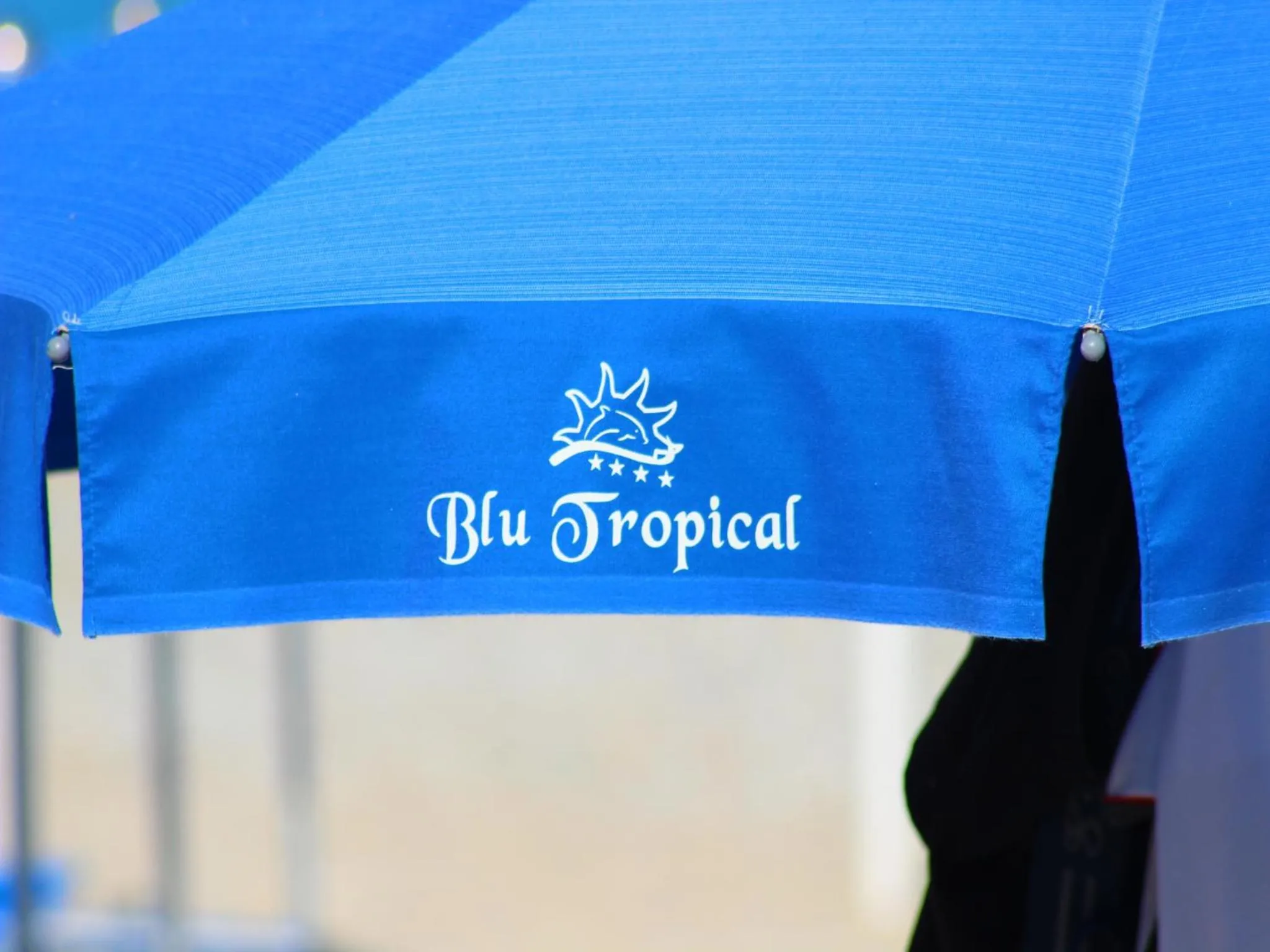 Property logo or sign in Blu Tropical Resort