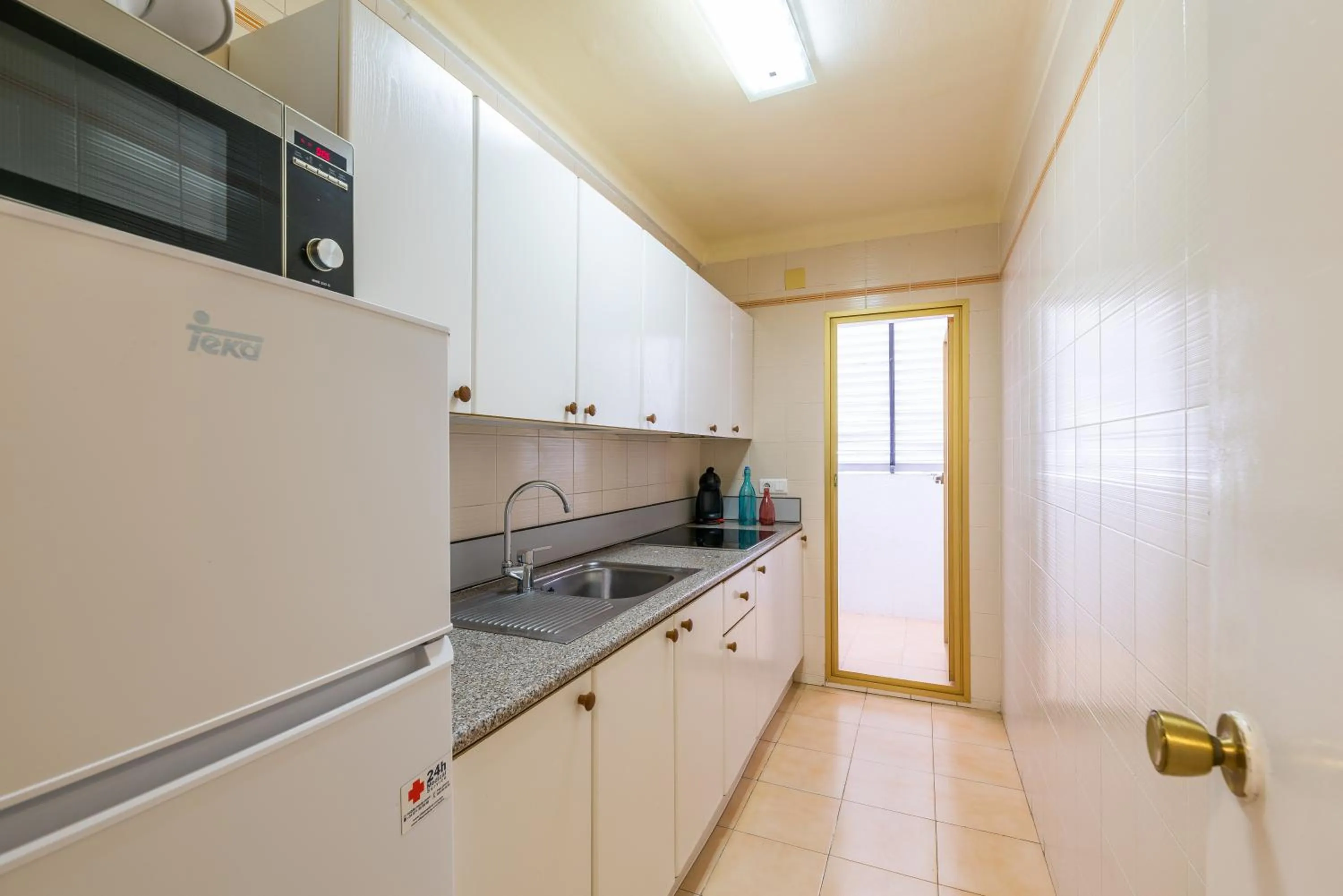 Kitchen or kitchenette in Rentalmar Pins Marina
