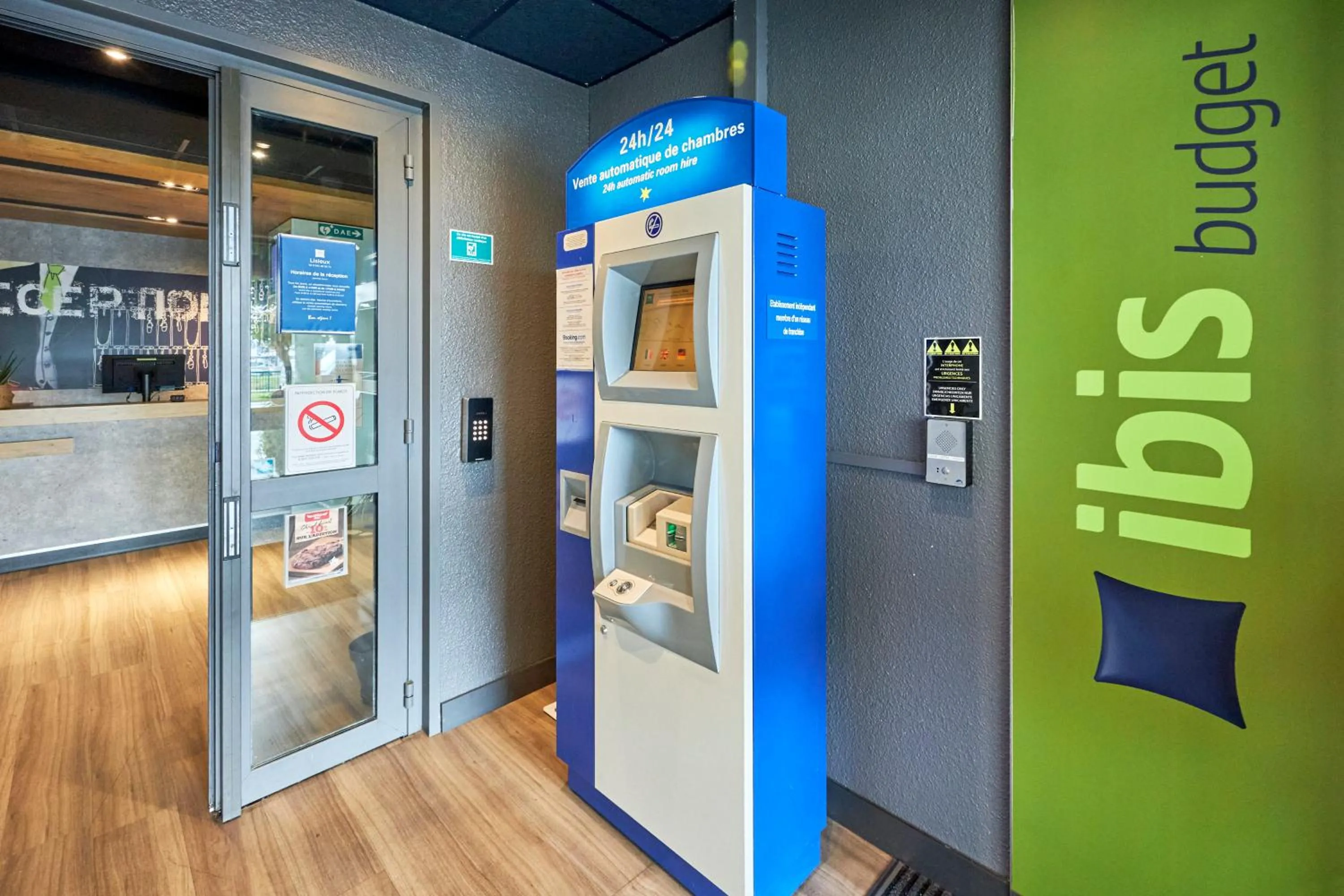 Lobby or reception in ibis budget Lisieux