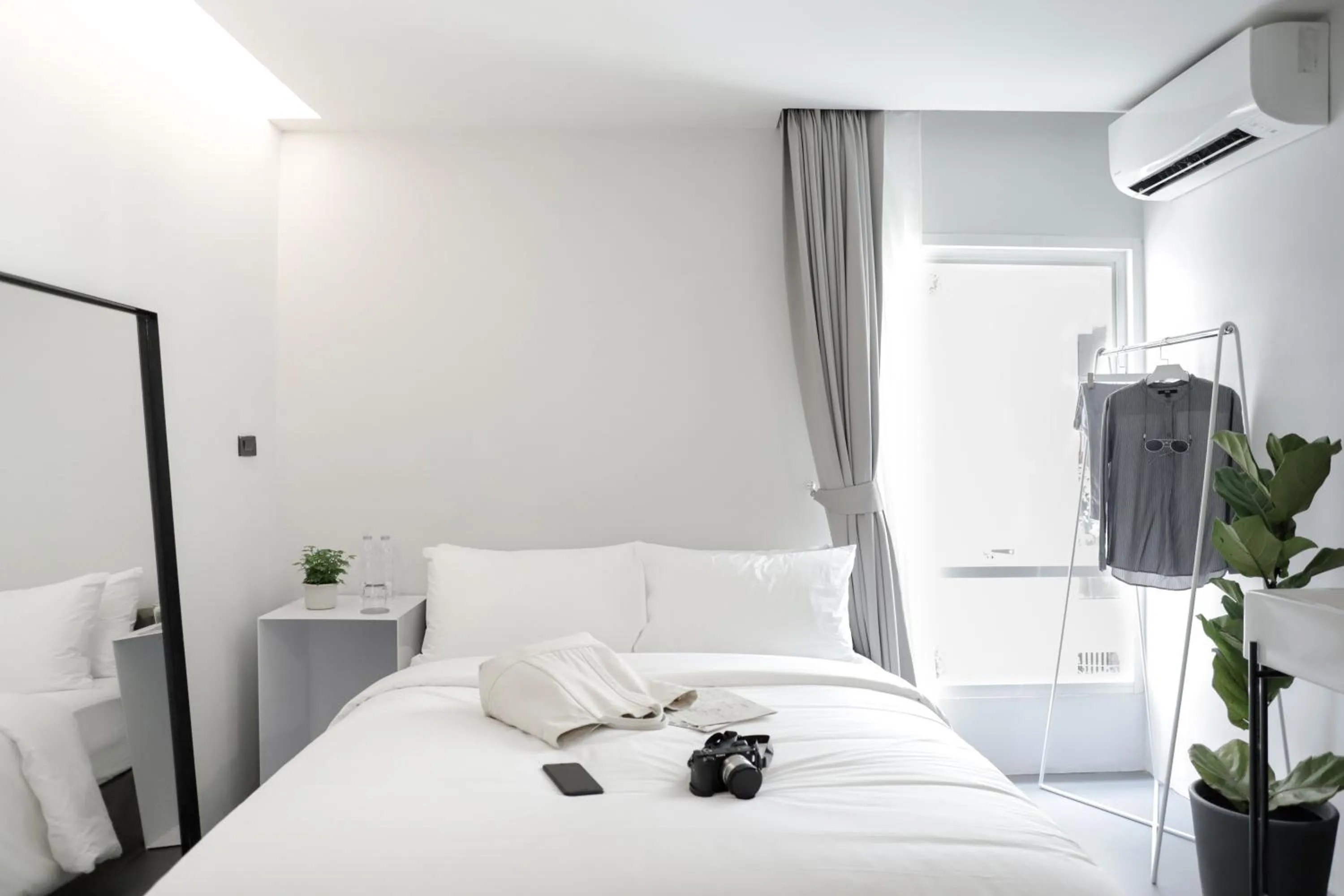 Photo of the whole room, Bed in Chocolate box mint