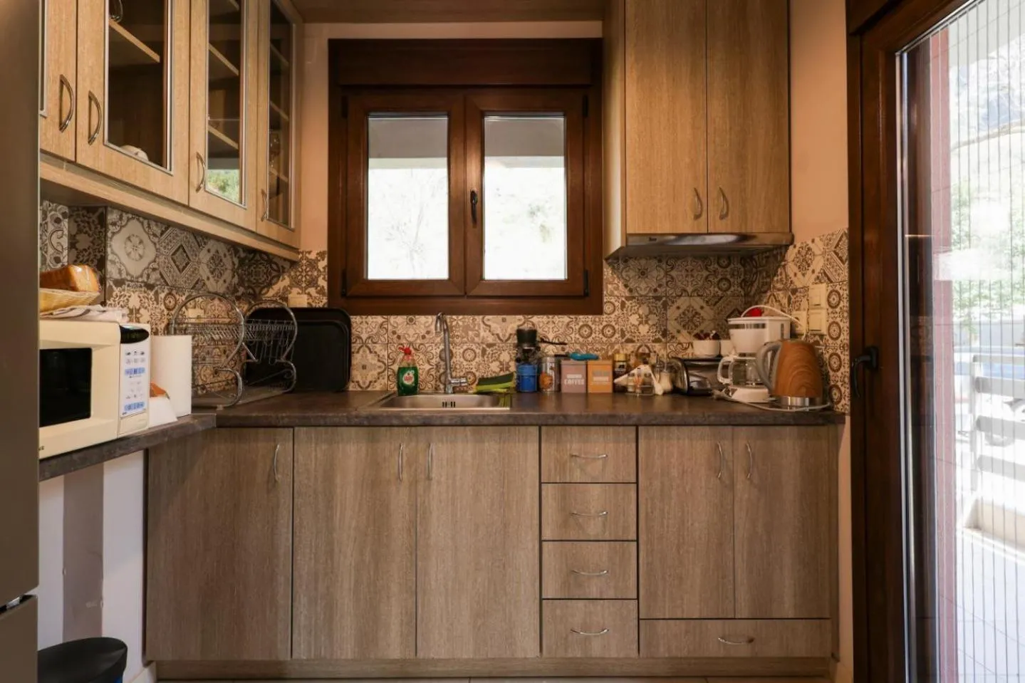 Kitchen or kitchenette in Elia Deluxe Accommodation