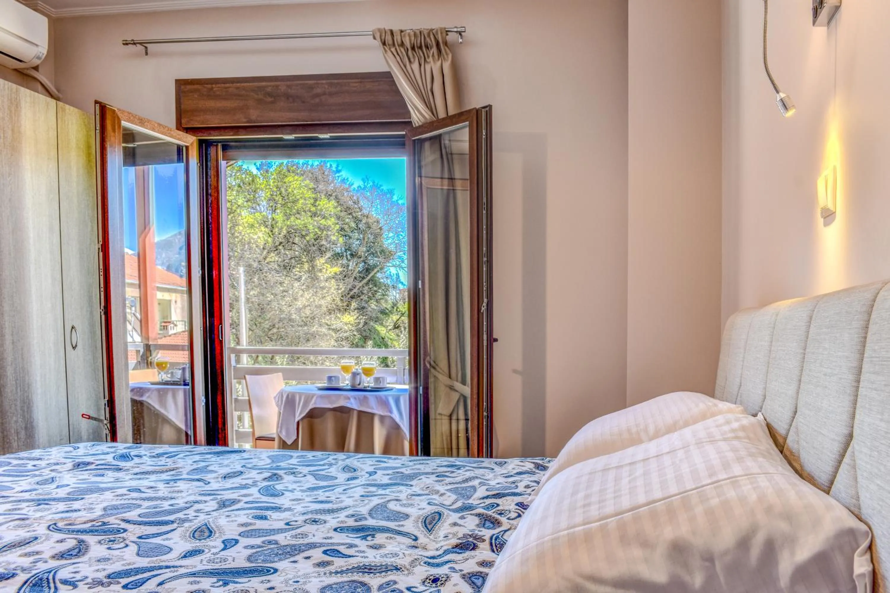 Bed in Elia Deluxe Accommodation