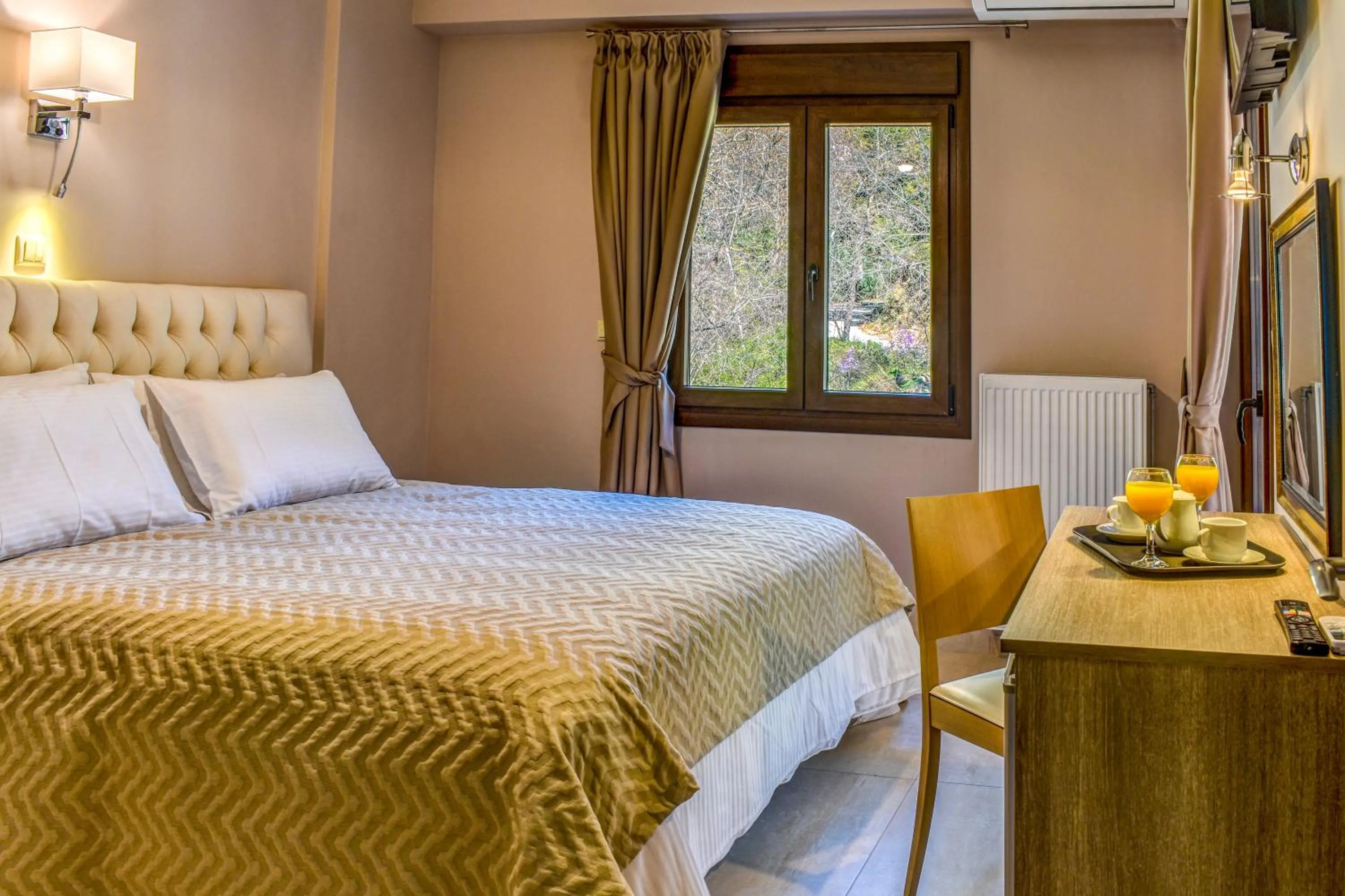 Bed in Elia Deluxe Accommodation