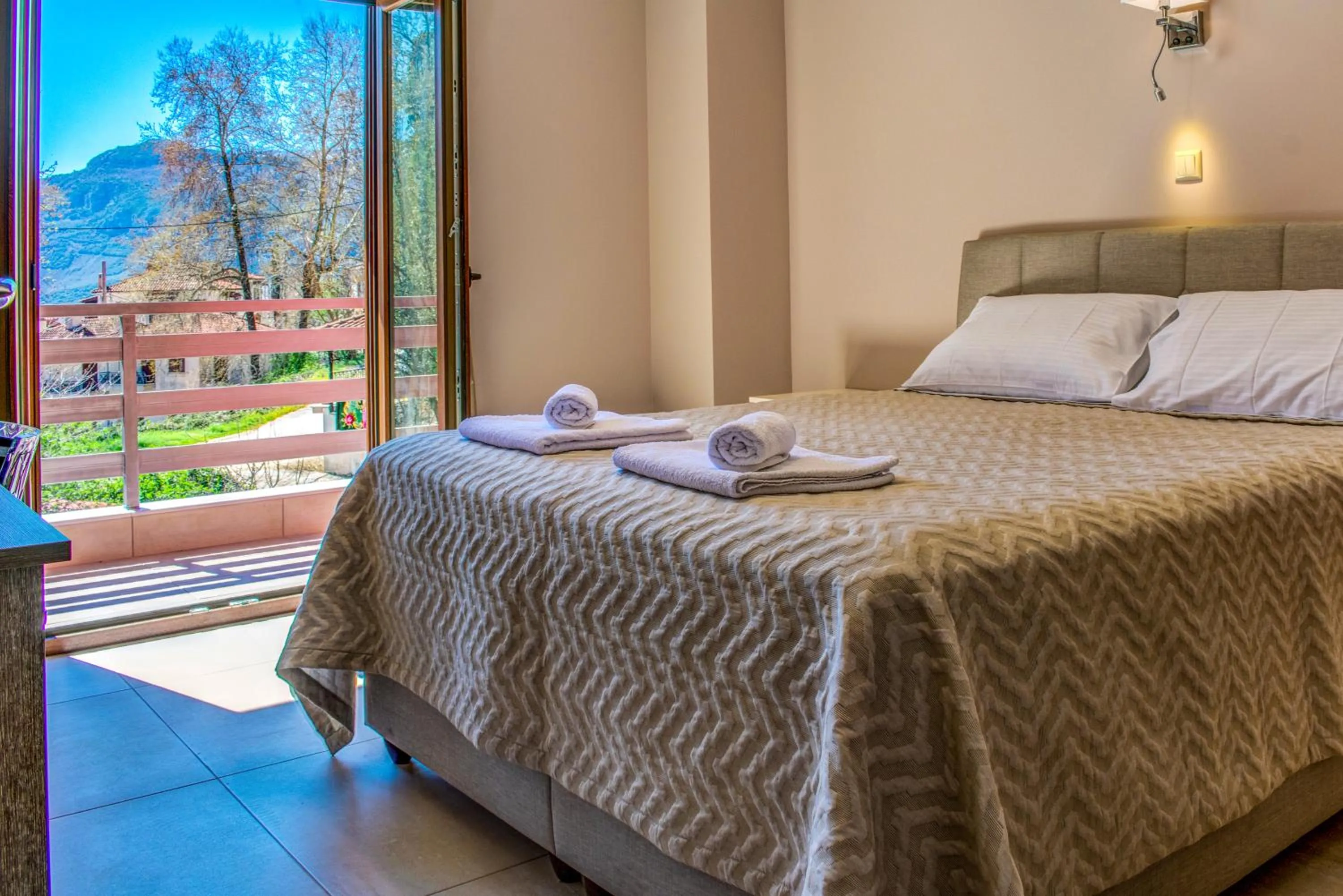 Bed in Elia Deluxe Accommodation