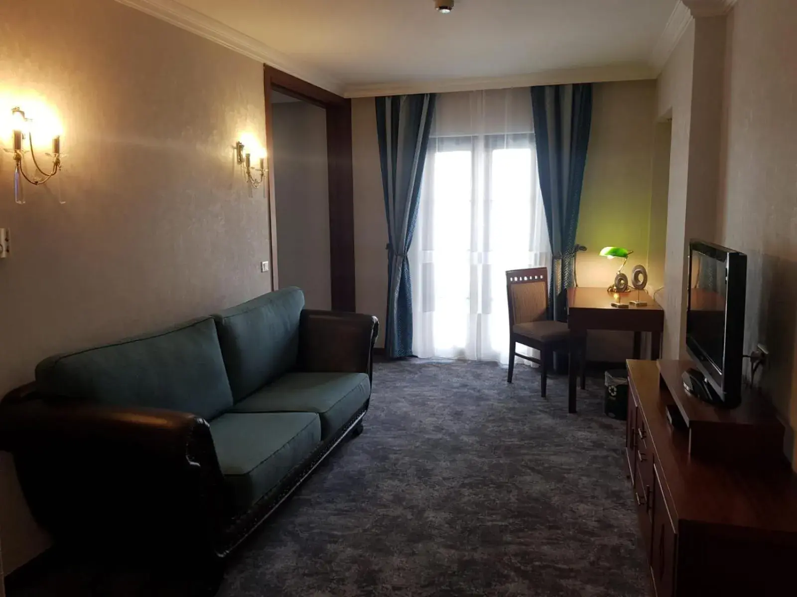 Living room in Midas Hotel Living room in Midas Hotel