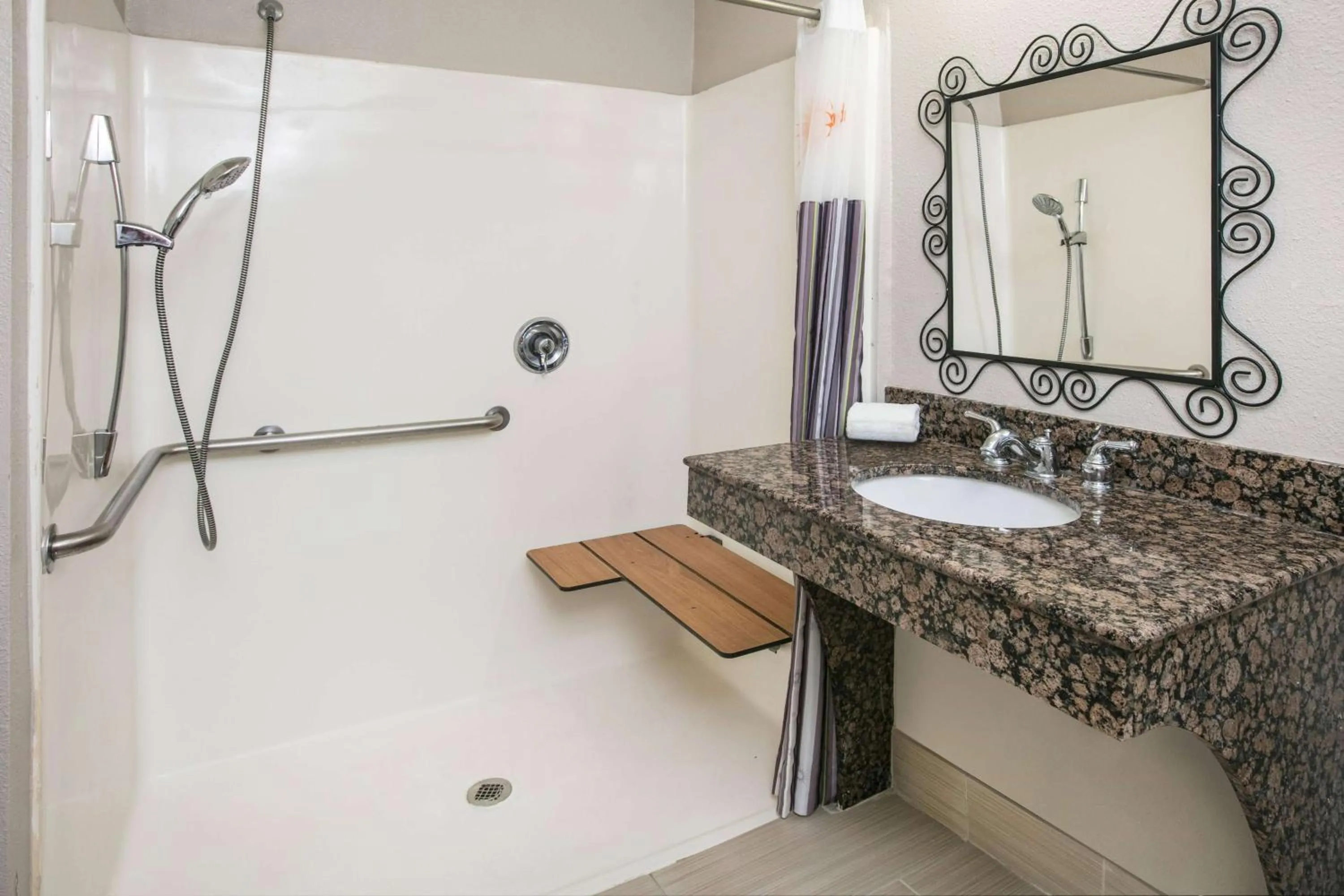 Bathroom in Baymont by Wyndham Dallas South-DeSoto